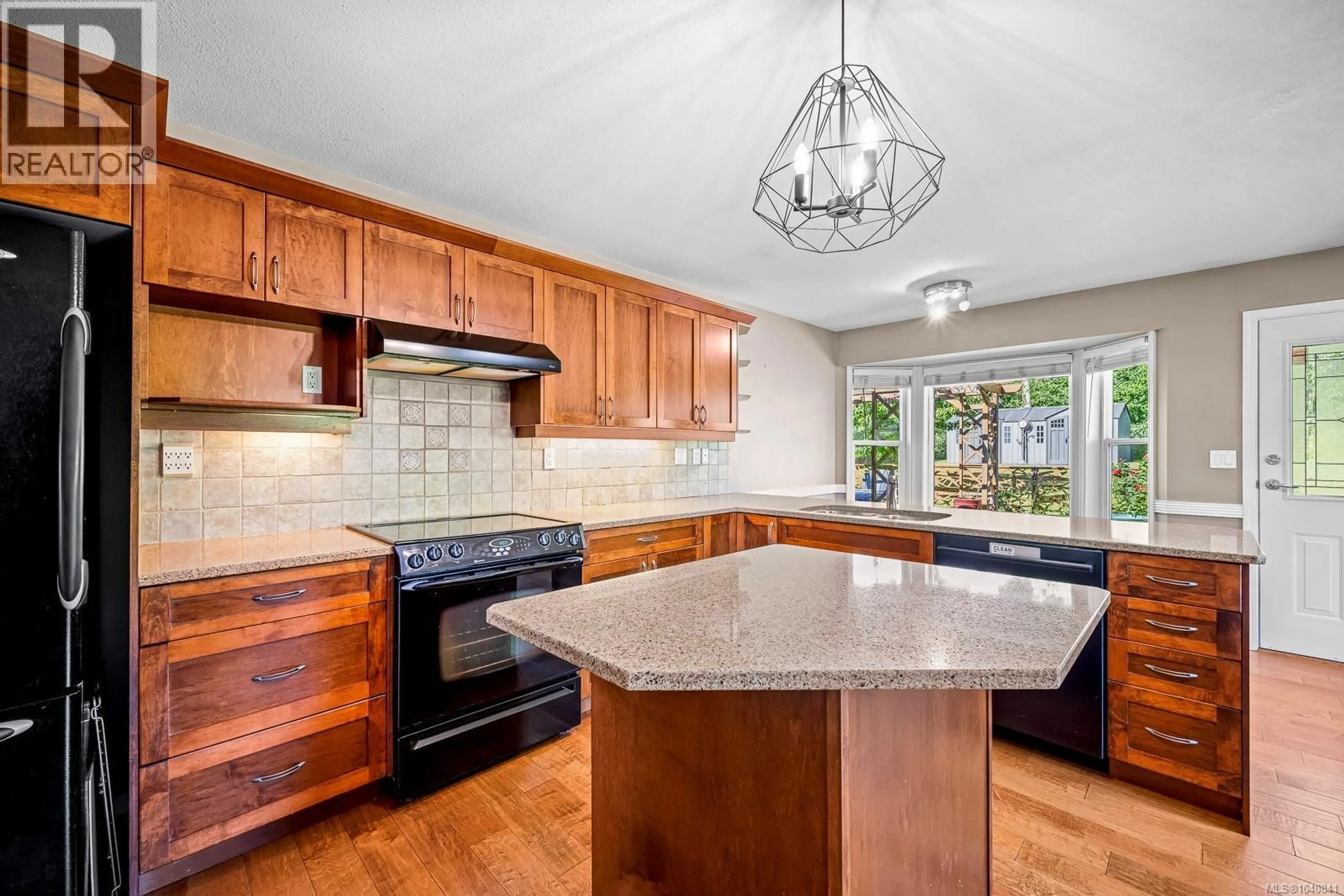 Open concept kitchen, ceramic/tile floor for 4722 CRUICKSHANK PLACE, Courtenay British Columbia V9N4B6