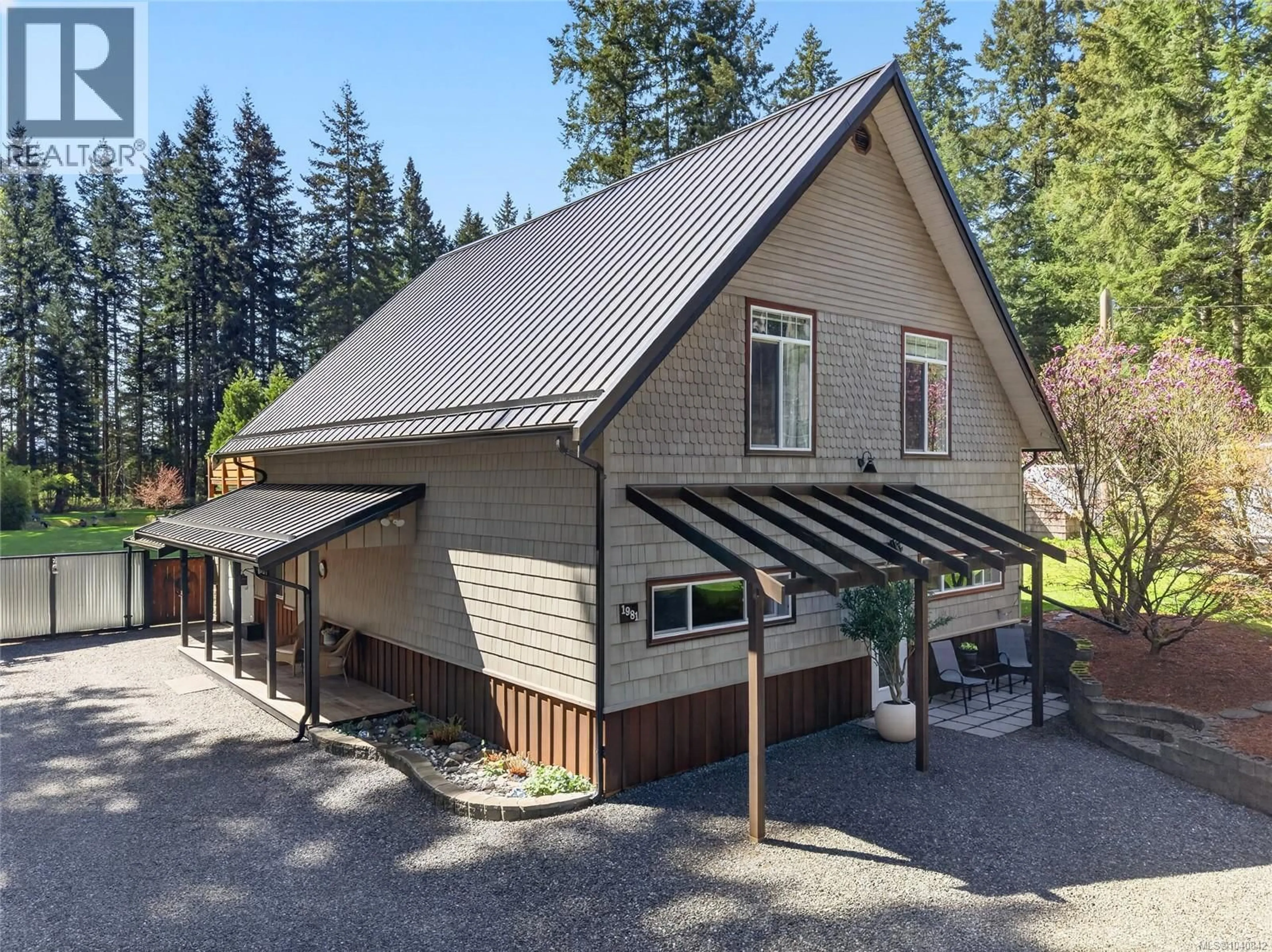 A pic from outside/outdoor area/front of a property/back of a property/a pic from drone, unknown for 1981 DZINI ROAD, Black Creek British Columbia V9J1H1