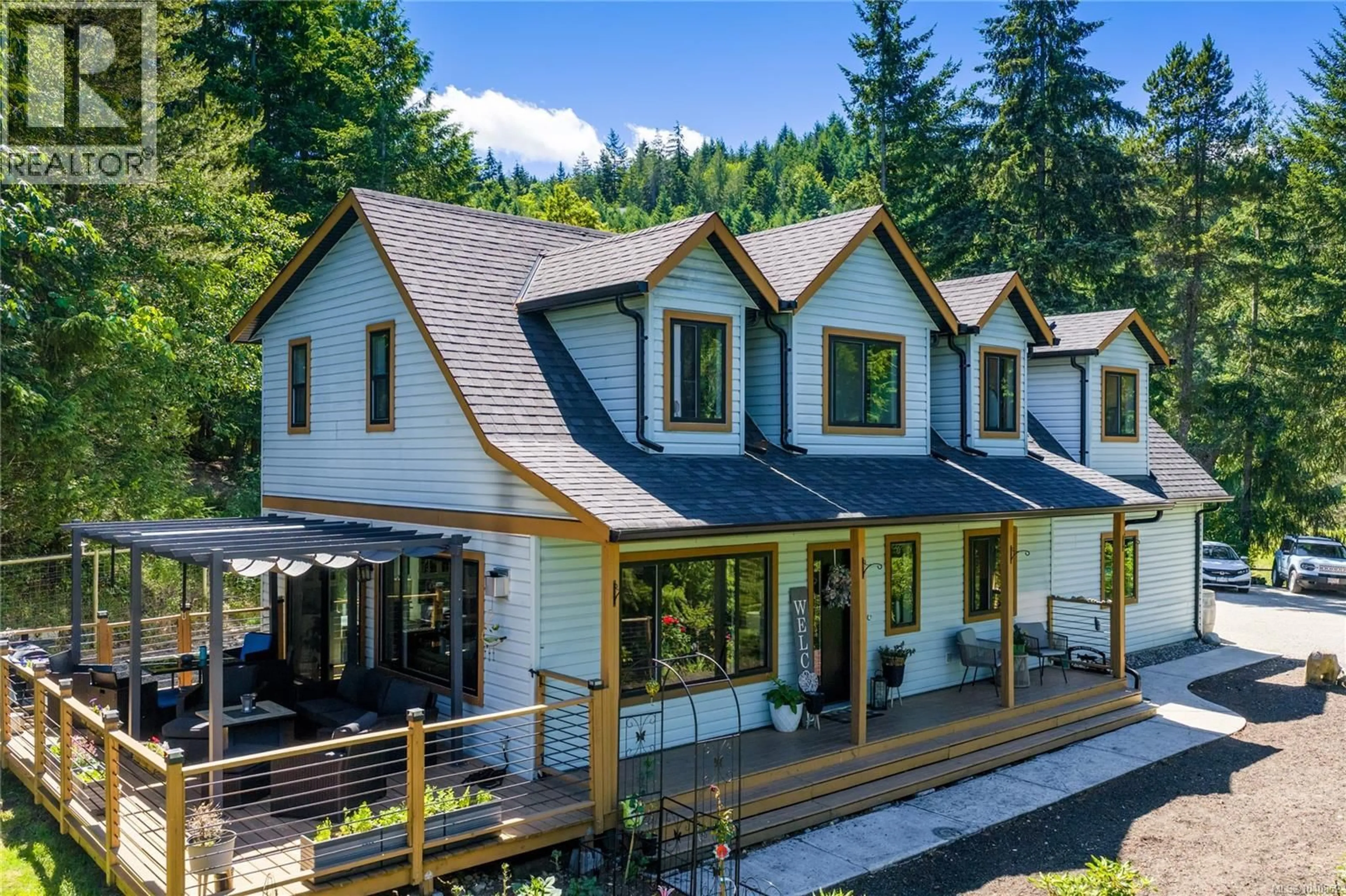 A pic from outside/outdoor area/front of a property/back of a property/a pic from drone, unknown for 1691 MEADOWOOD WAY, Qualicum Beach British Columbia V9K2S3