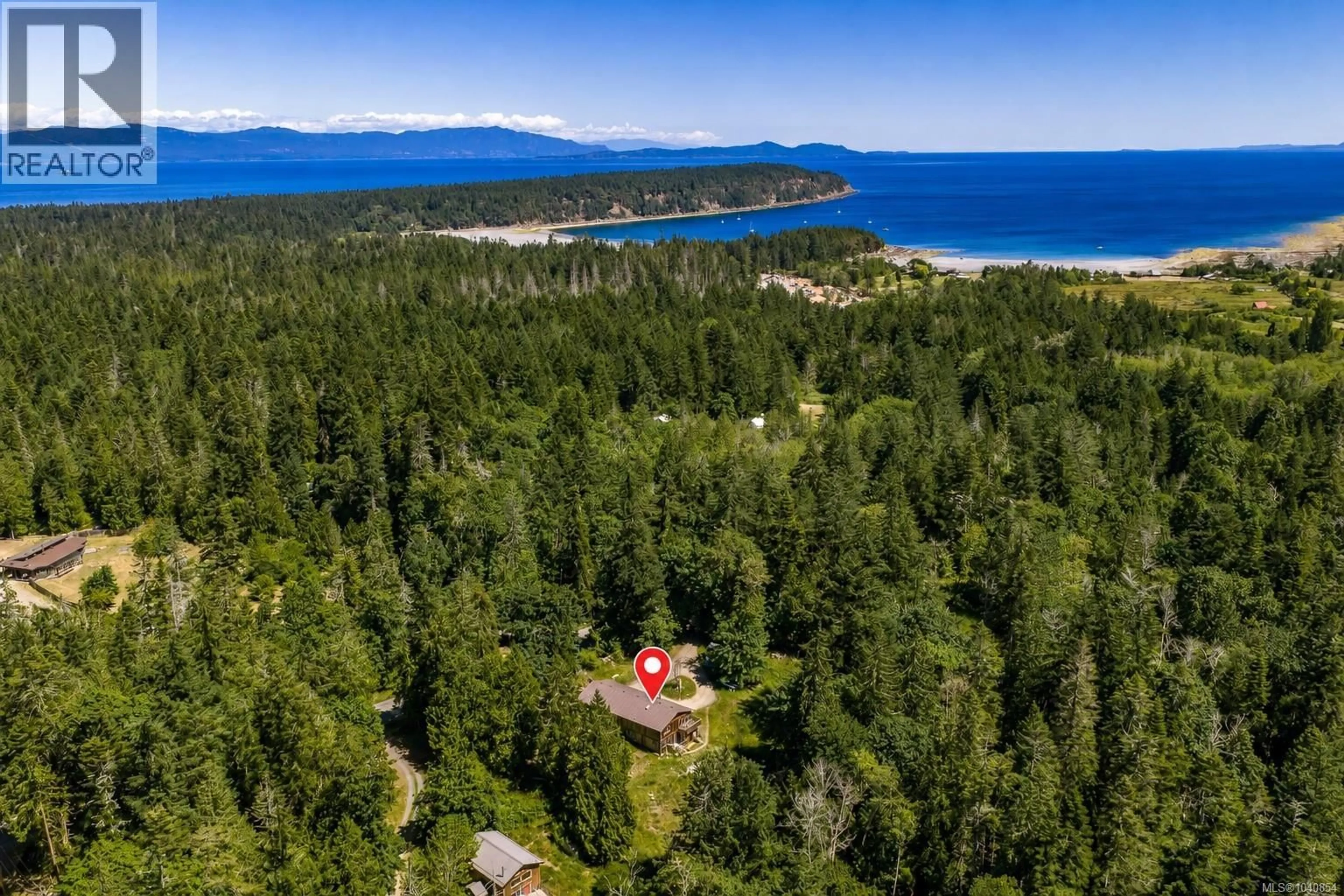 A pic from outside/outdoor area/front of a property/back of a property/a pic from drone, water/lake/river/ocean view for 5160 CENTRAL ROAD, Hornby Island British Columbia V0R1Z0