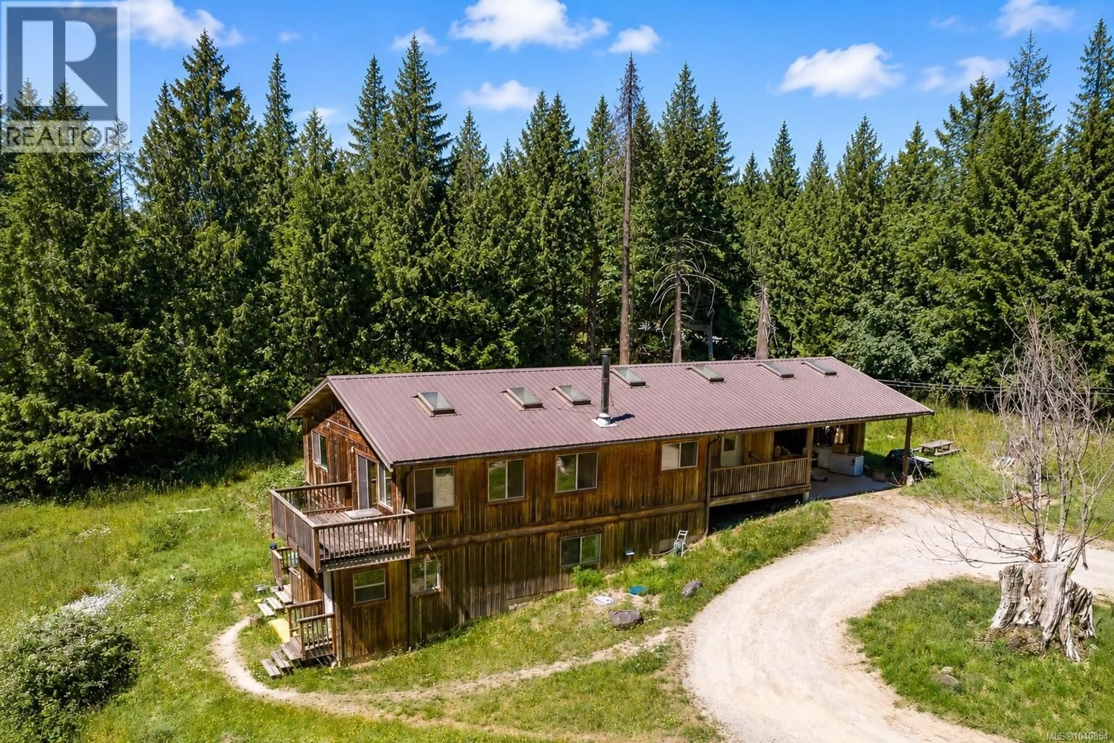 A pic from outside/outdoor area/front of a property/back of a property/a pic from drone, forest/trees view for 5160 CENTRAL ROAD, Hornby Island British Columbia V0R1Z0