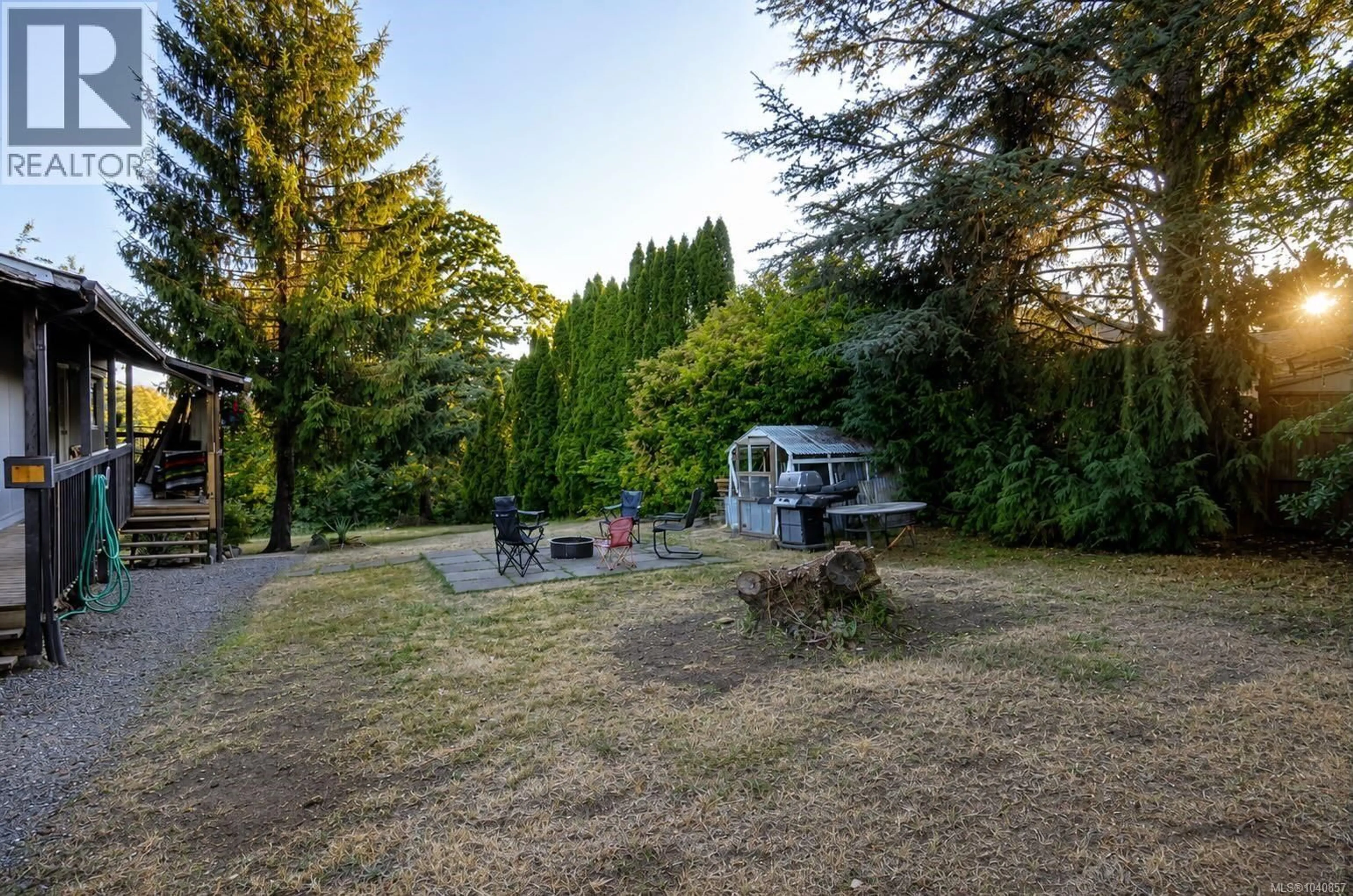A pic from outside/outdoor area/front of a property/back of a property/a pic from drone, forest/trees view for 4649 MCQUILLAN ROAD, Courtenay British Columbia V9N3T6
