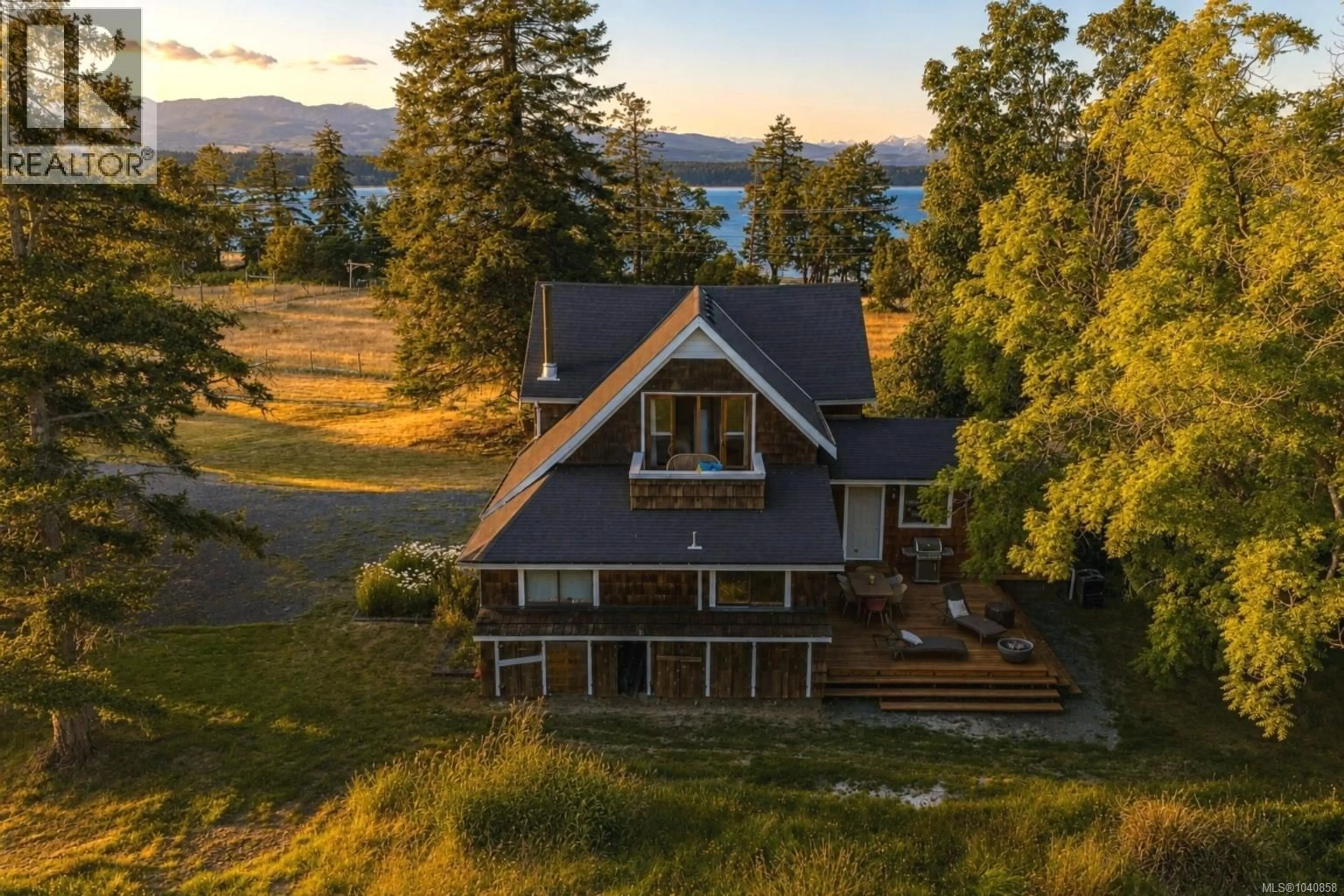 A pic from outside/outdoor area/front of a property/back of a property/a pic from drone, water/lake/river/ocean view for 500 CENTRAL ROAD, Hornby Island British Columbia V0R1Z0