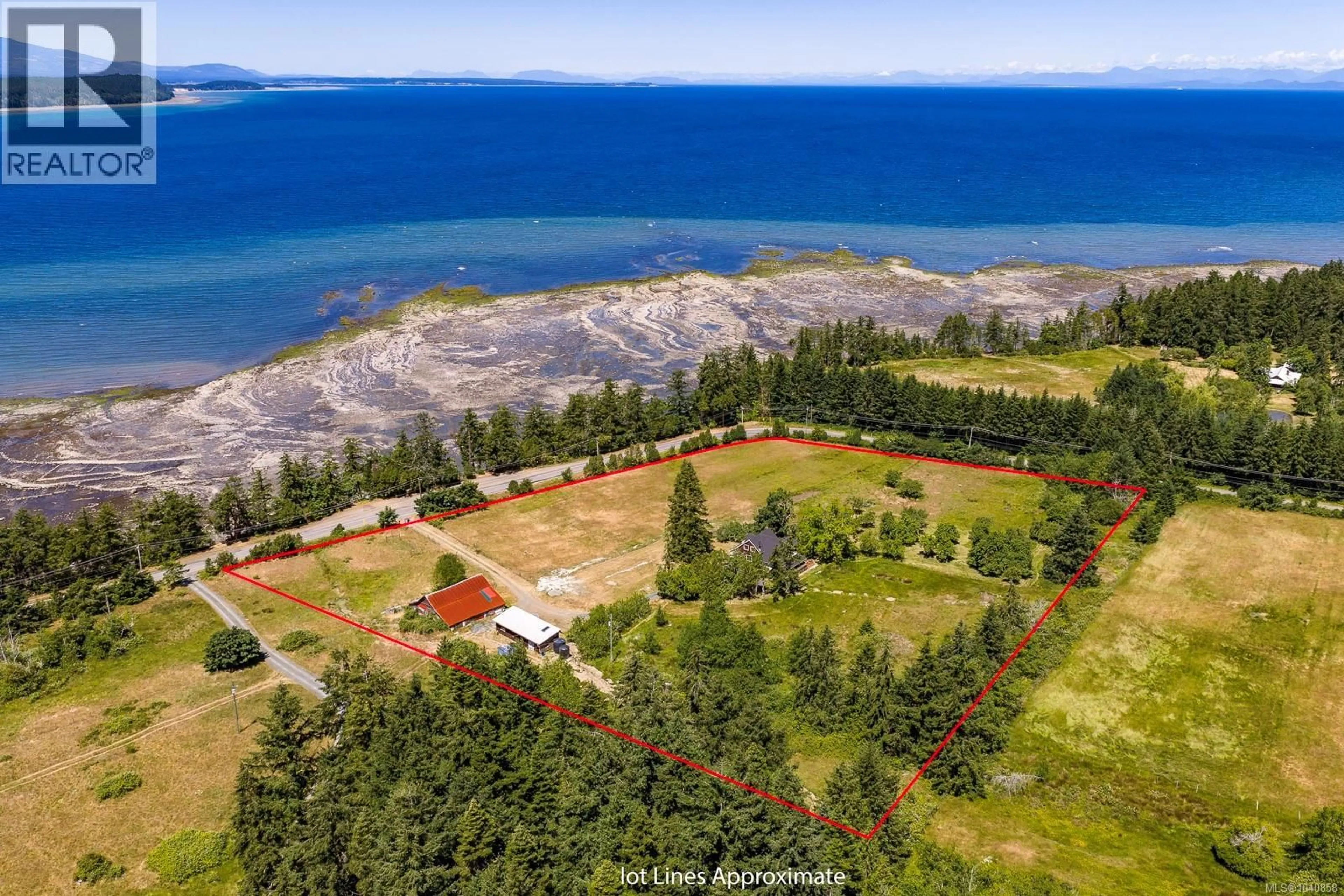 A pic from outside/outdoor area/front of a property/back of a property/a pic from drone, water/lake/river/ocean view for 500 CENTRAL ROAD, Hornby Island British Columbia V0R1Z0