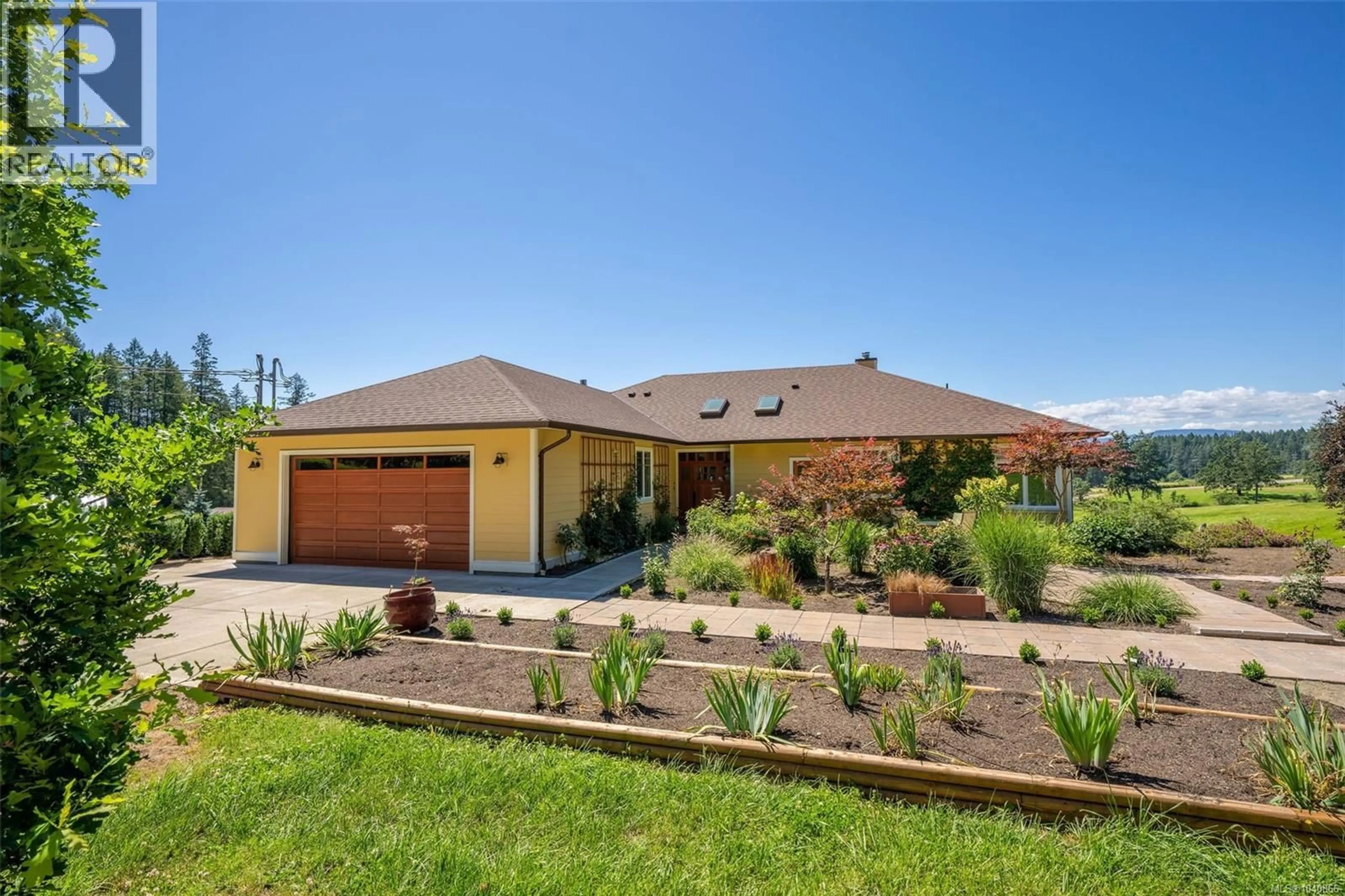 Home with brick exterior material, unknown for 7000 MAYS ROAD, Duncan British Columbia V9L6A6