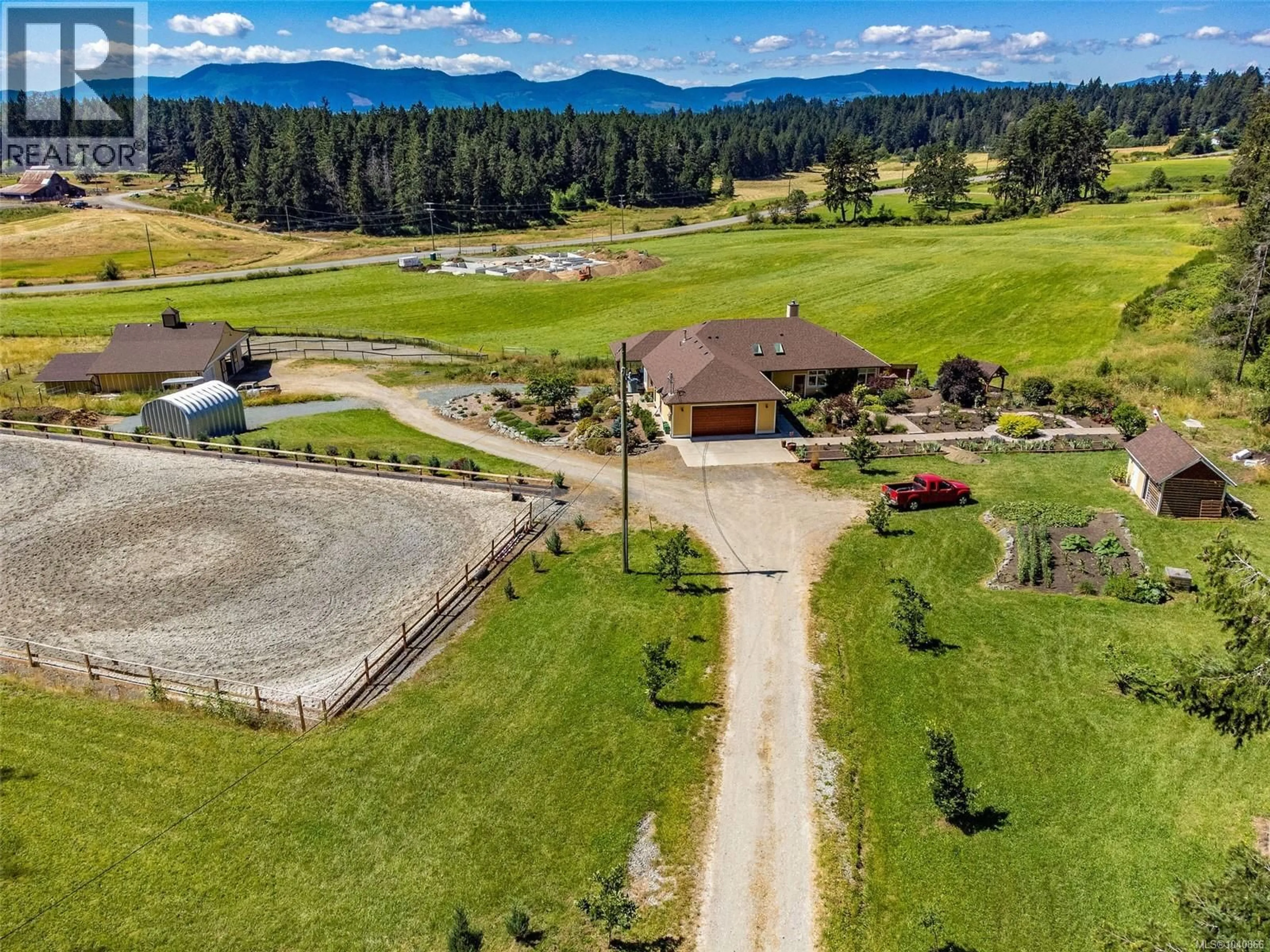A pic from outside/outdoor area/front of a property/back of a property/a pic from drone, mountain view for 7000 MAYS ROAD, Duncan British Columbia V9L6A6