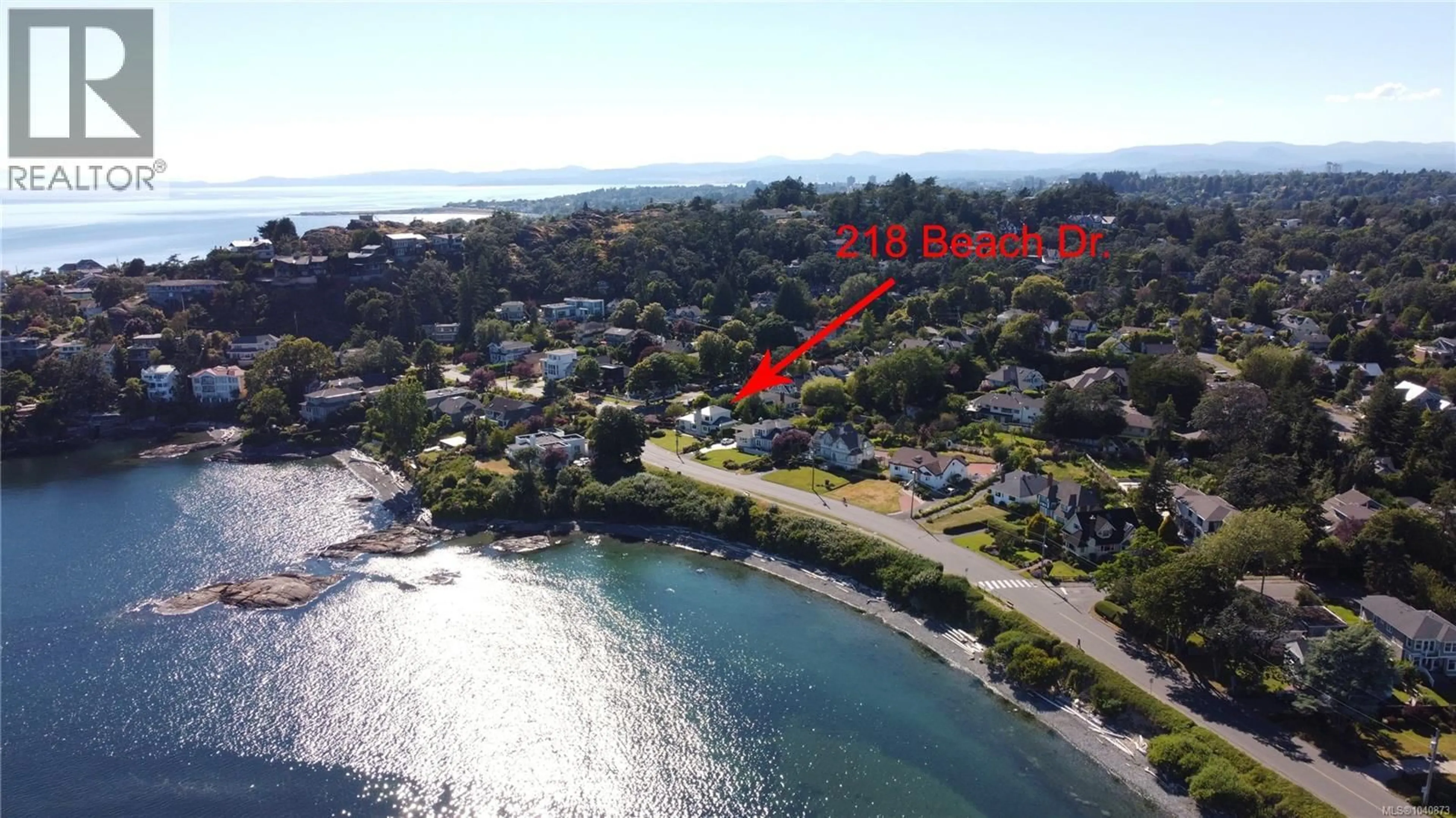 A pic from outside/outdoor area/front of a property/back of a property/a pic from drone, water/lake/river/ocean view for 218 BEACH DRIVE, Oak Bay British Columbia V8S2M1