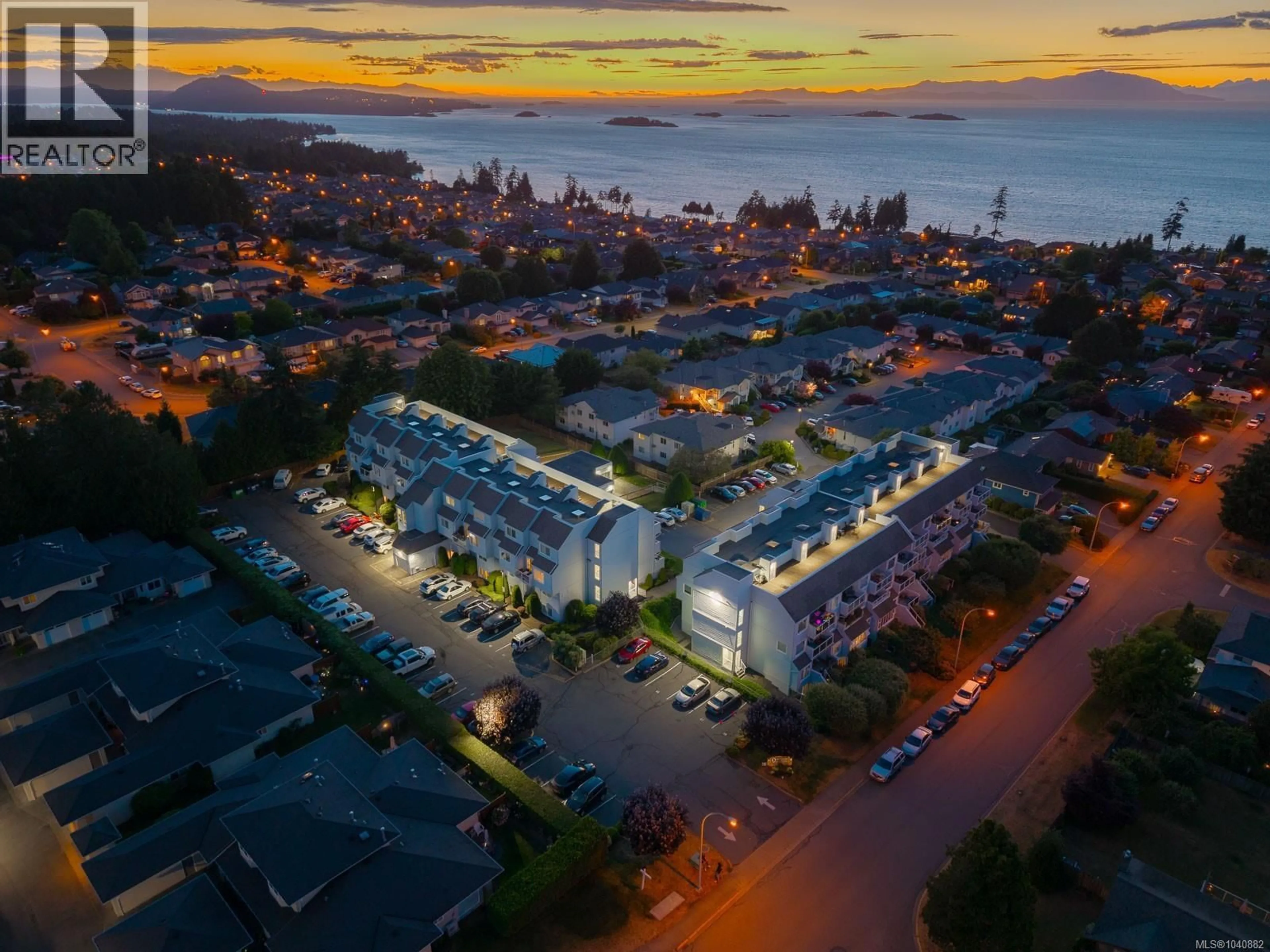 A pic from outside/outdoor area/front of a property/back of a property/a pic from drone, street for 106B - 6231 BLUEBACK ROAD, Nanaimo British Columbia V9V1J3