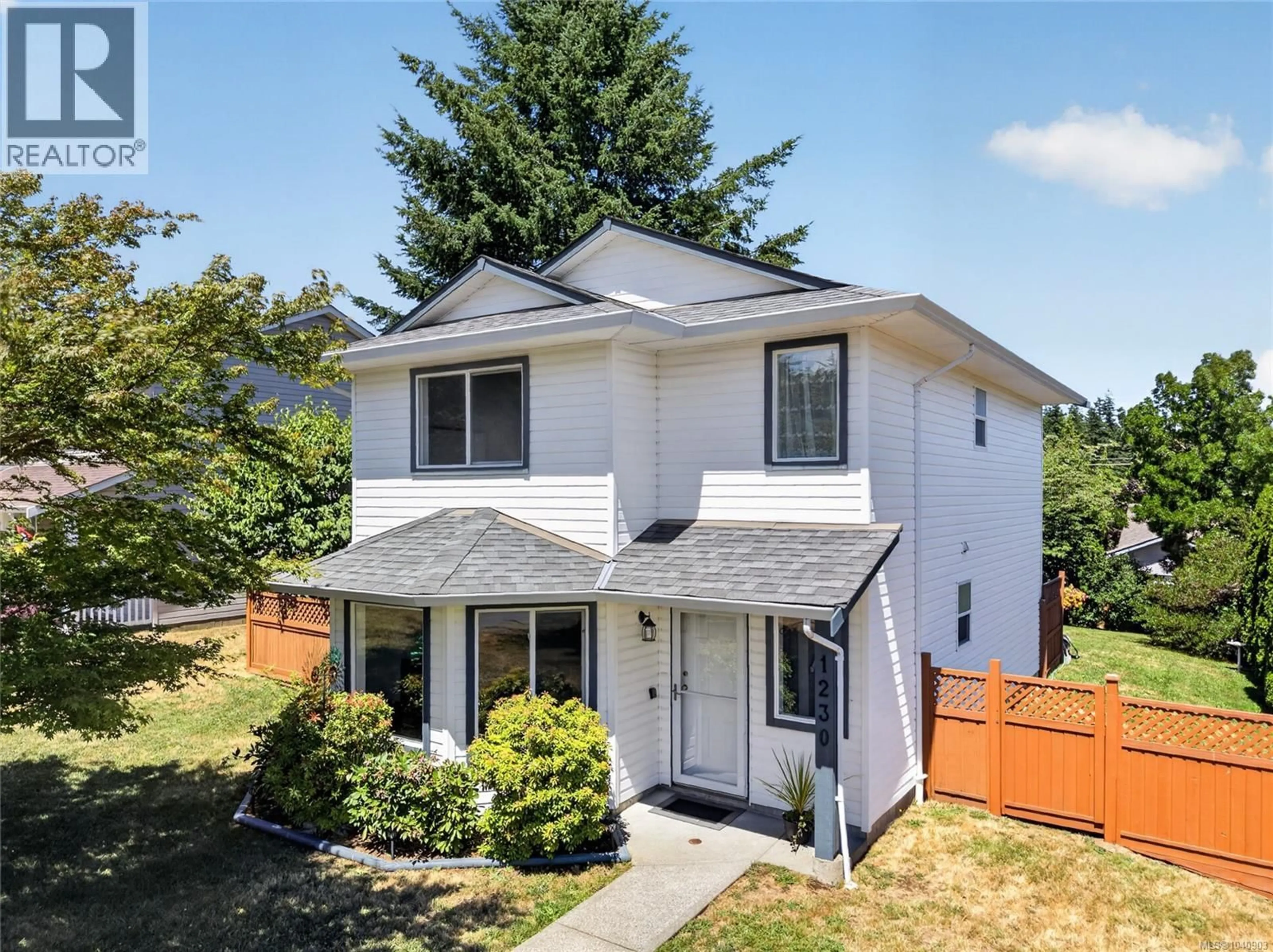 Home with vinyl exterior material, street for 1230 BECKTON DRIVE, Comox British Columbia V9M3R2