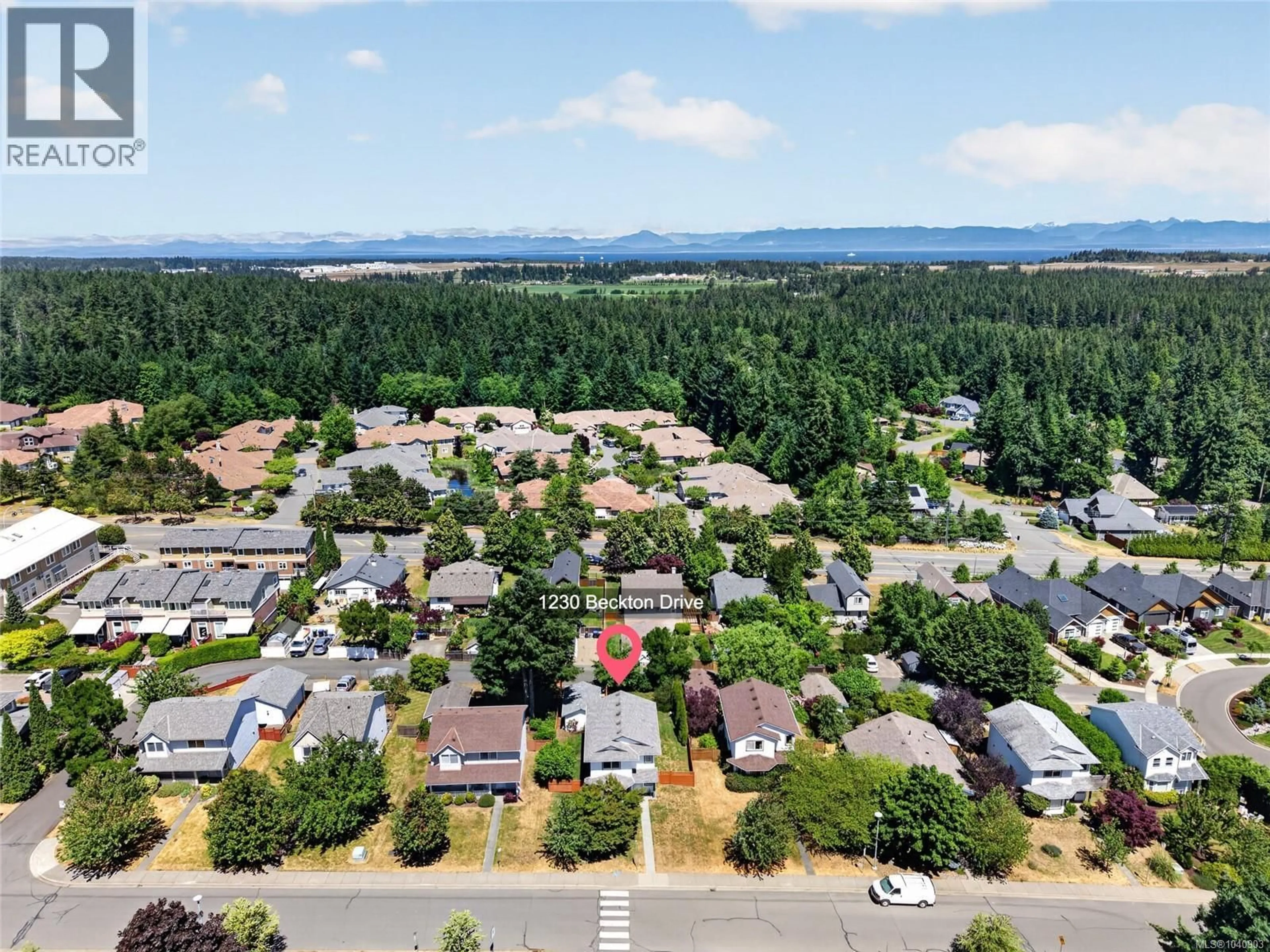 A pic from outside/outdoor area/front of a property/back of a property/a pic from drone, mountain view for 1230 BECKTON DRIVE, Comox British Columbia V9M3R2
