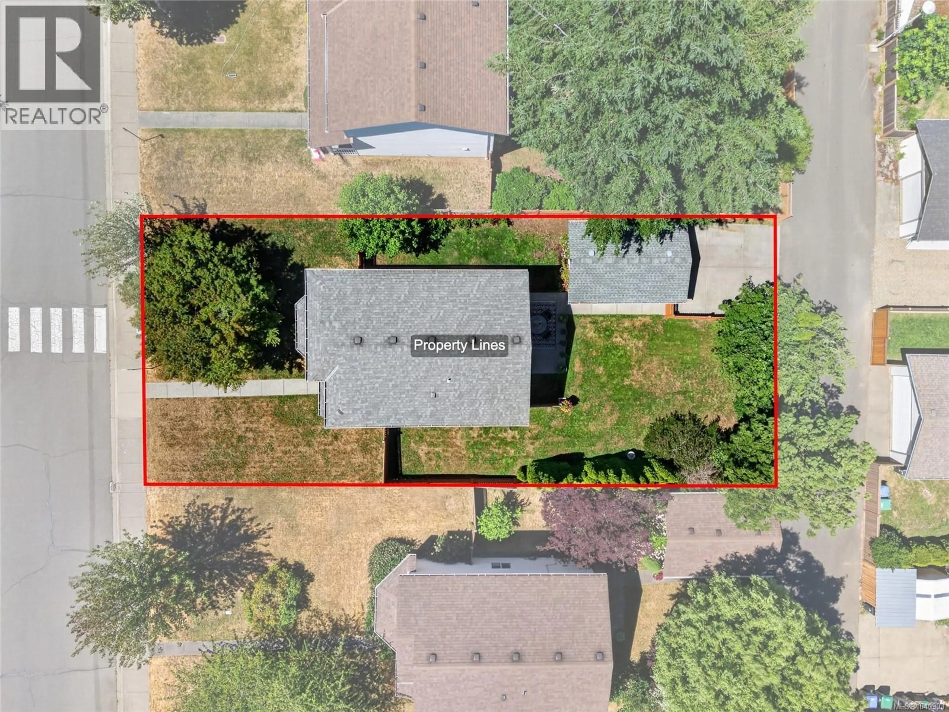 A pic from outside/outdoor area/front of a property/back of a property/a pic from drone, street for 1230 BECKTON DRIVE, Comox British Columbia V9M3R2