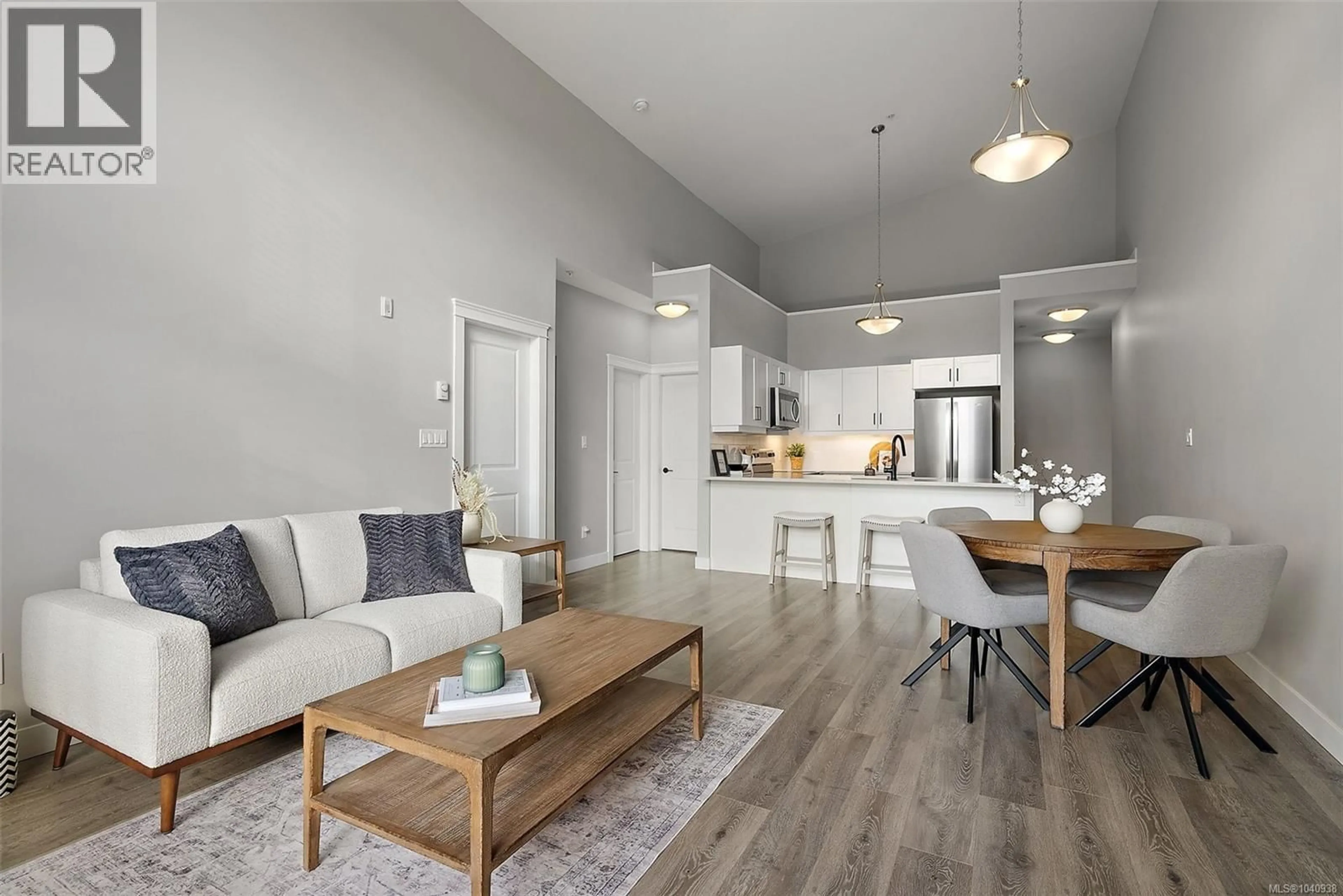 Open concept kitchen, wood/laminate floor for 403 - 844 GOLDSTREAM AVENUE, Langford British Columbia V9B2X7