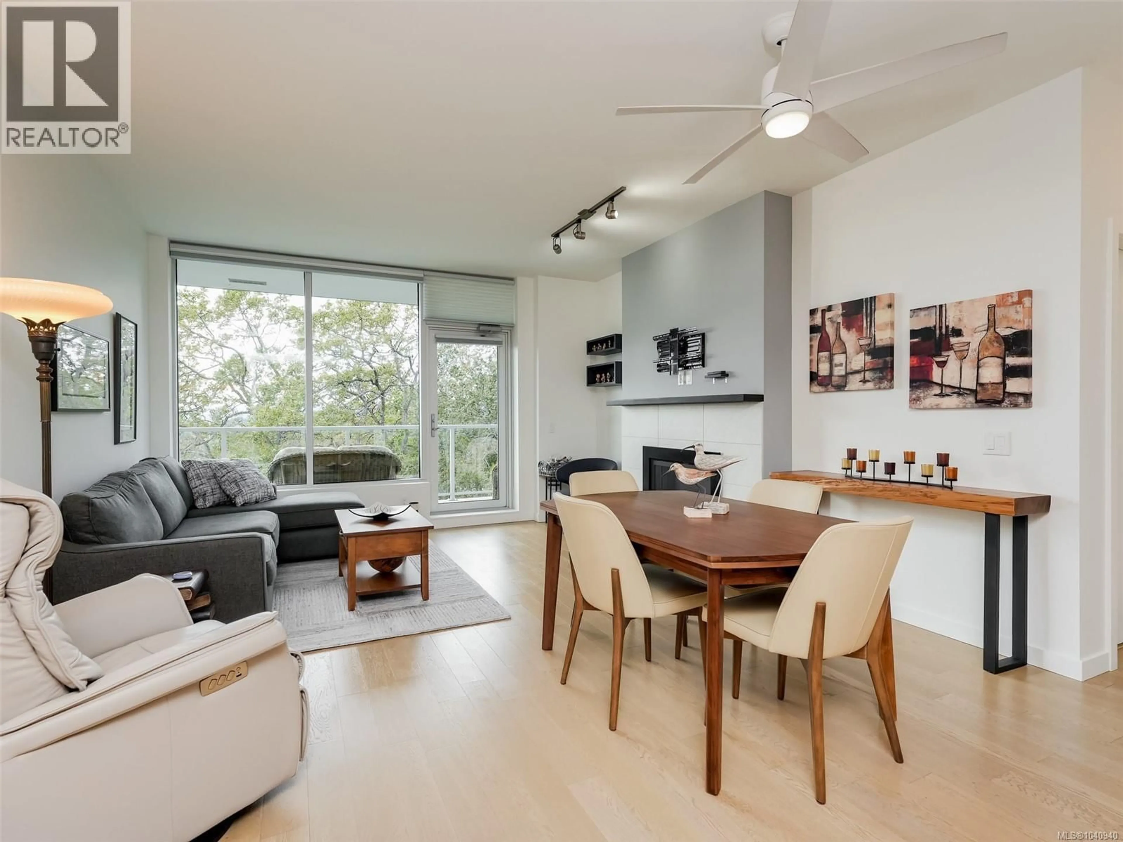 Living room with furniture, wood/laminate floor for 603 - 4009 RAINBOW HILL LANE, Saanich British Columbia V8X0B3