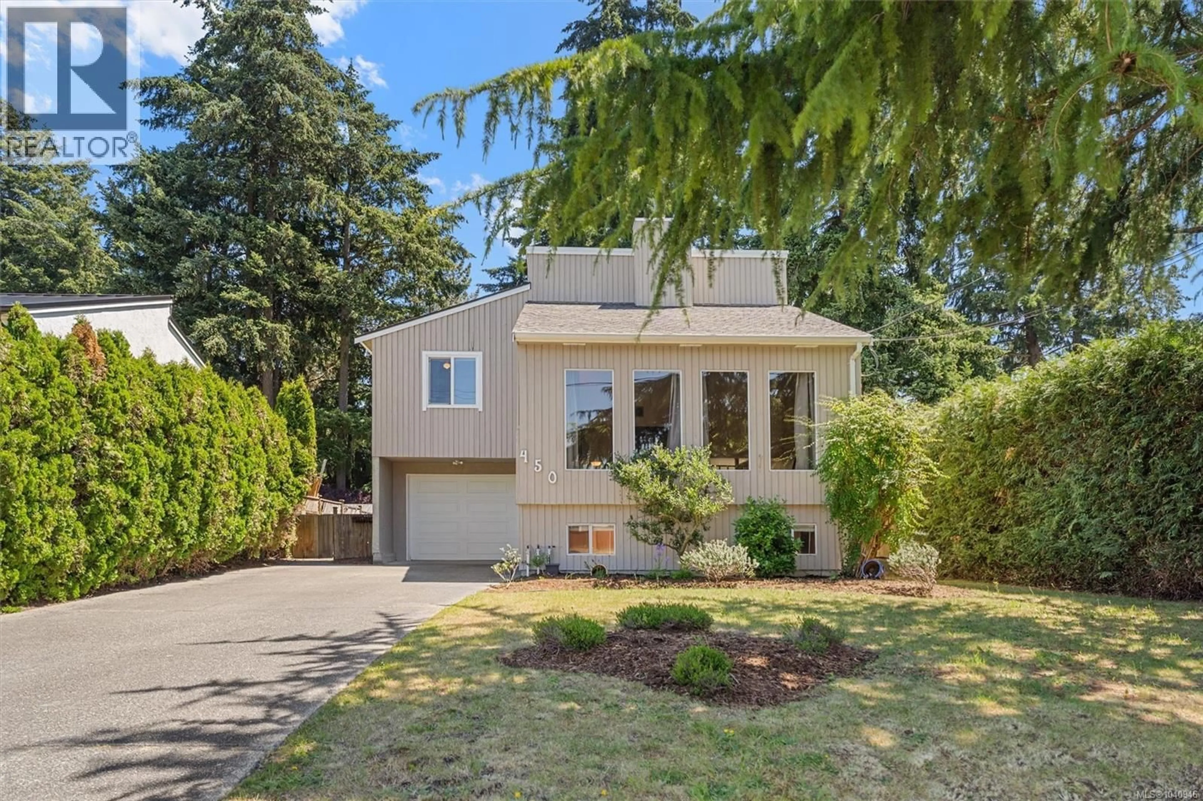 Home with vinyl exterior material, street for 450 TERRAHUE ROAD, Colwood British Columbia V9C2B5