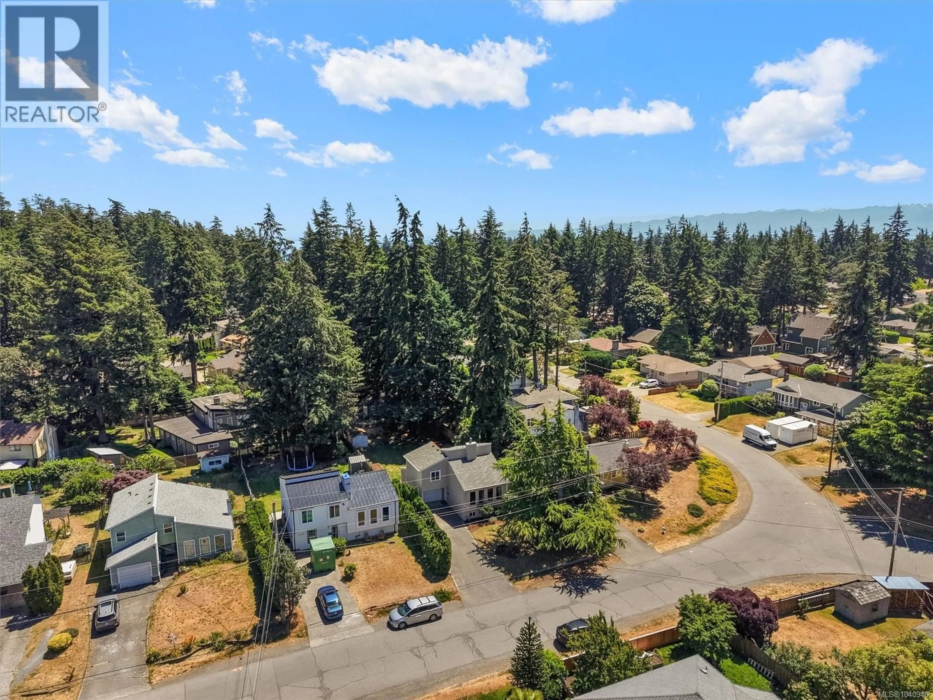 A pic from outside/outdoor area/front of a property/back of a property/a pic from drone, forest/trees view for 450 TERRAHUE ROAD, Colwood British Columbia V9C2B5