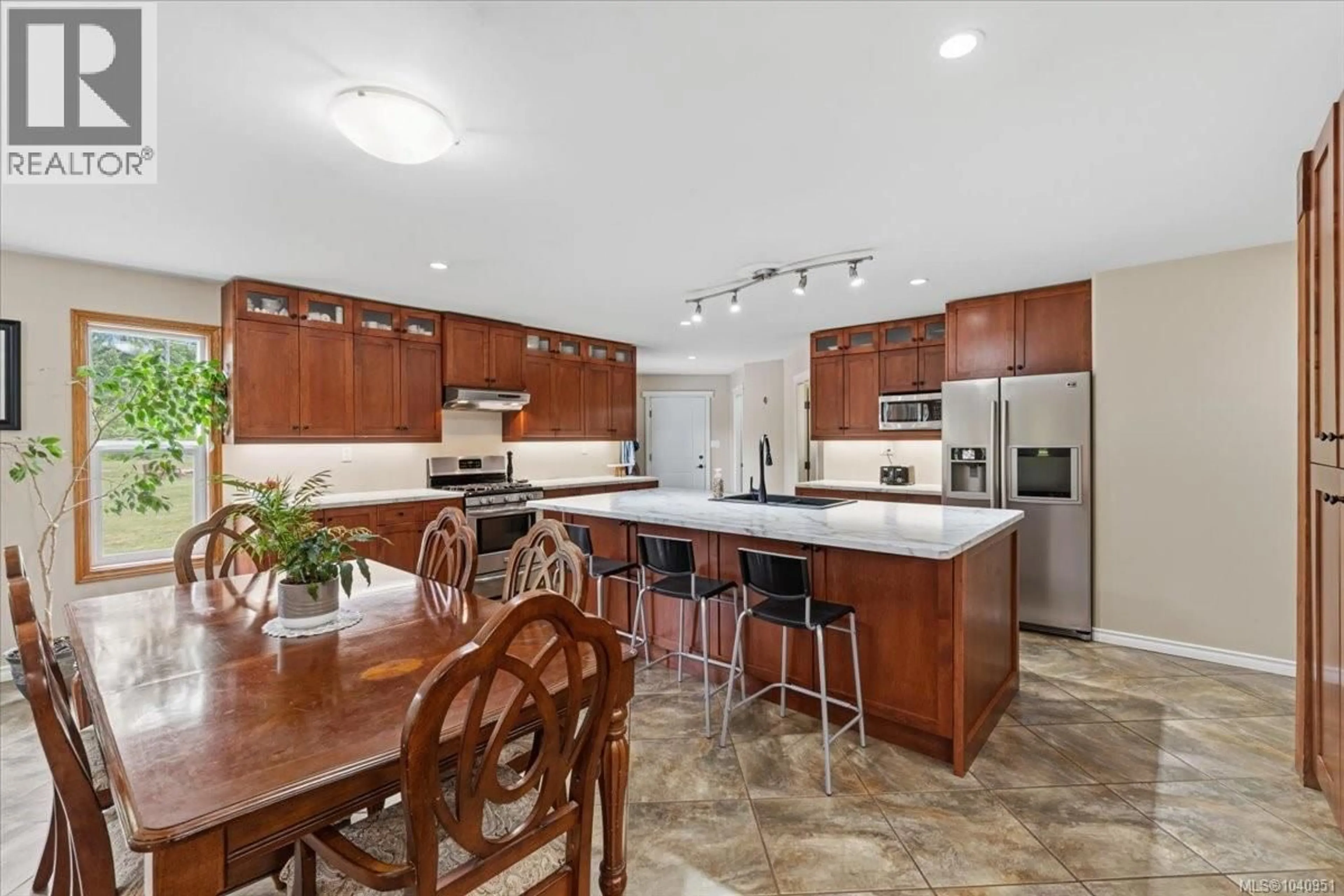 Open concept kitchen, ceramic/tile floor for 8204 WELLHAM ROAD, Port Alberni British Columbia V9Y8N1