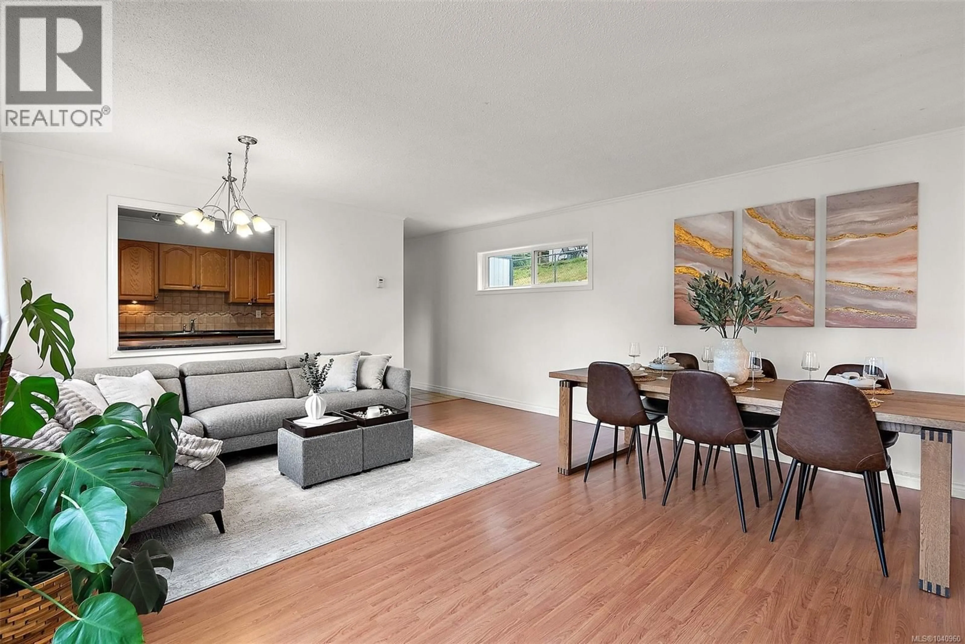 Living room with furniture, wood/laminate floor for A - 3100 VOLMER ROAD, Colwood British Columbia V9B2H6