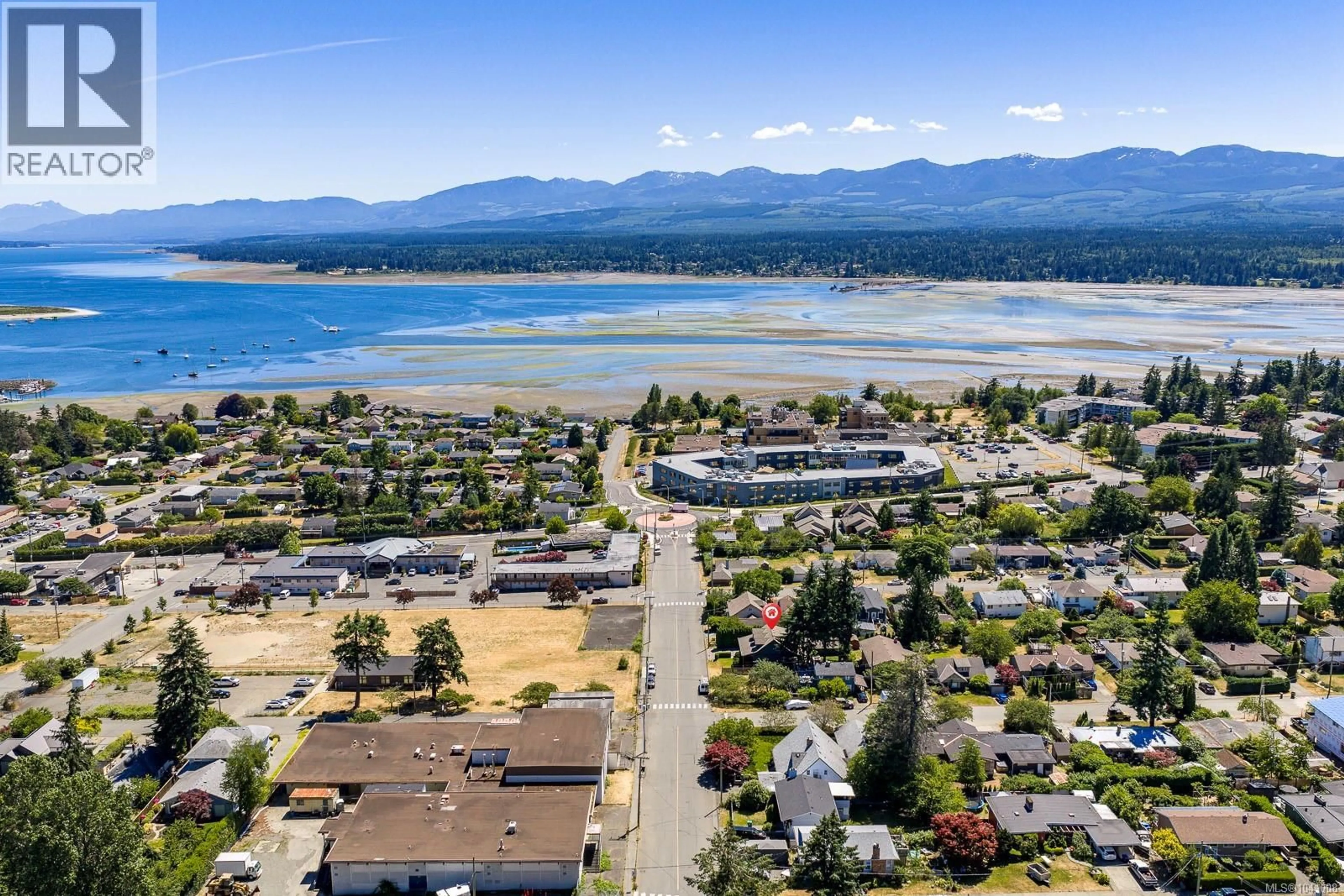 A pic from outside/outdoor area/front of a property/back of a property/a pic from drone, water/lake/river/ocean view for 297 RODELLO STREET, Comox British Columbia V9M1E2