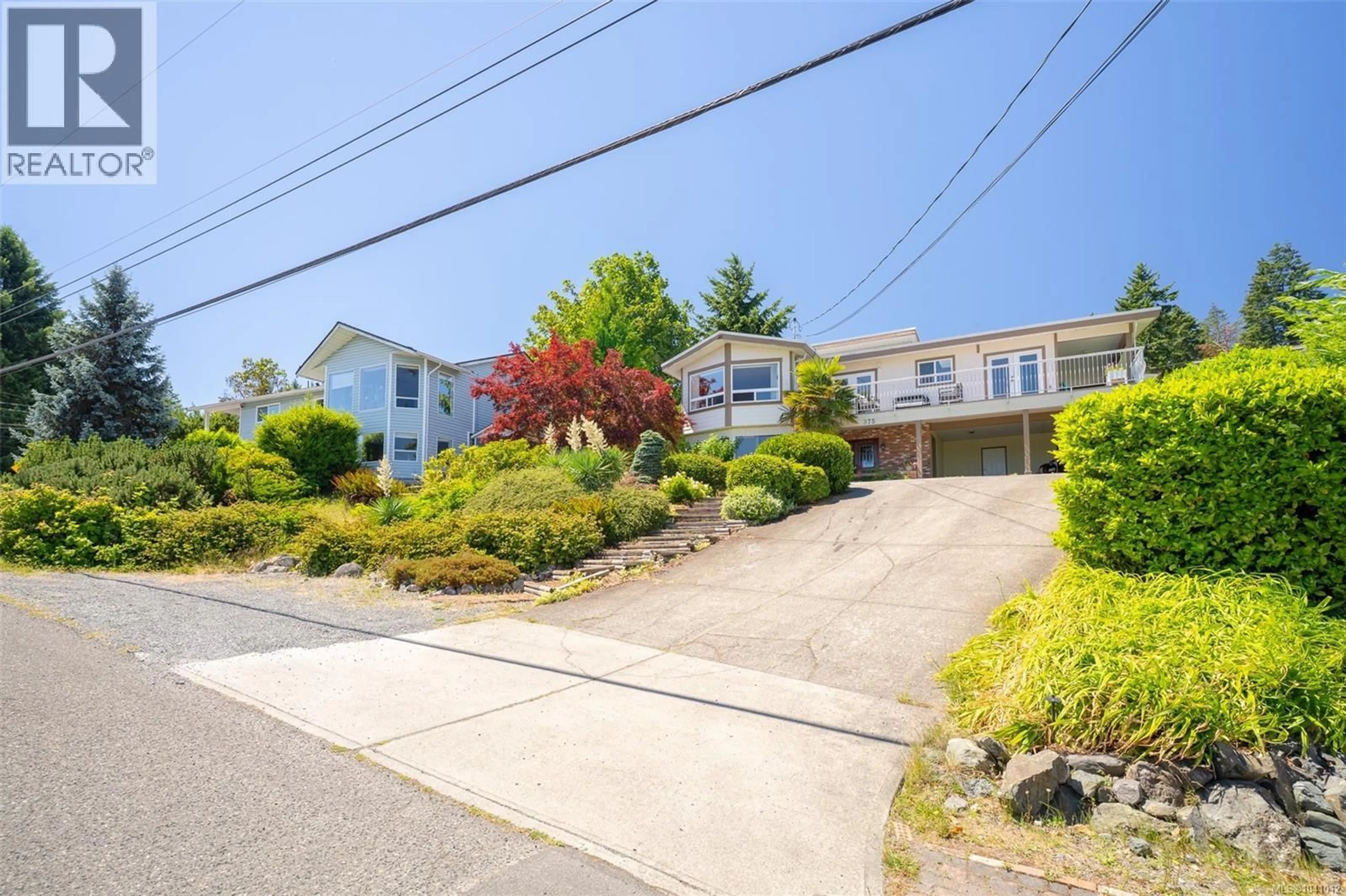 A pic from outside/outdoor area/front of a property/back of a property/a pic from drone, street for 375 CARIBOO DRIVE, Nanaimo British Columbia V9R6A4