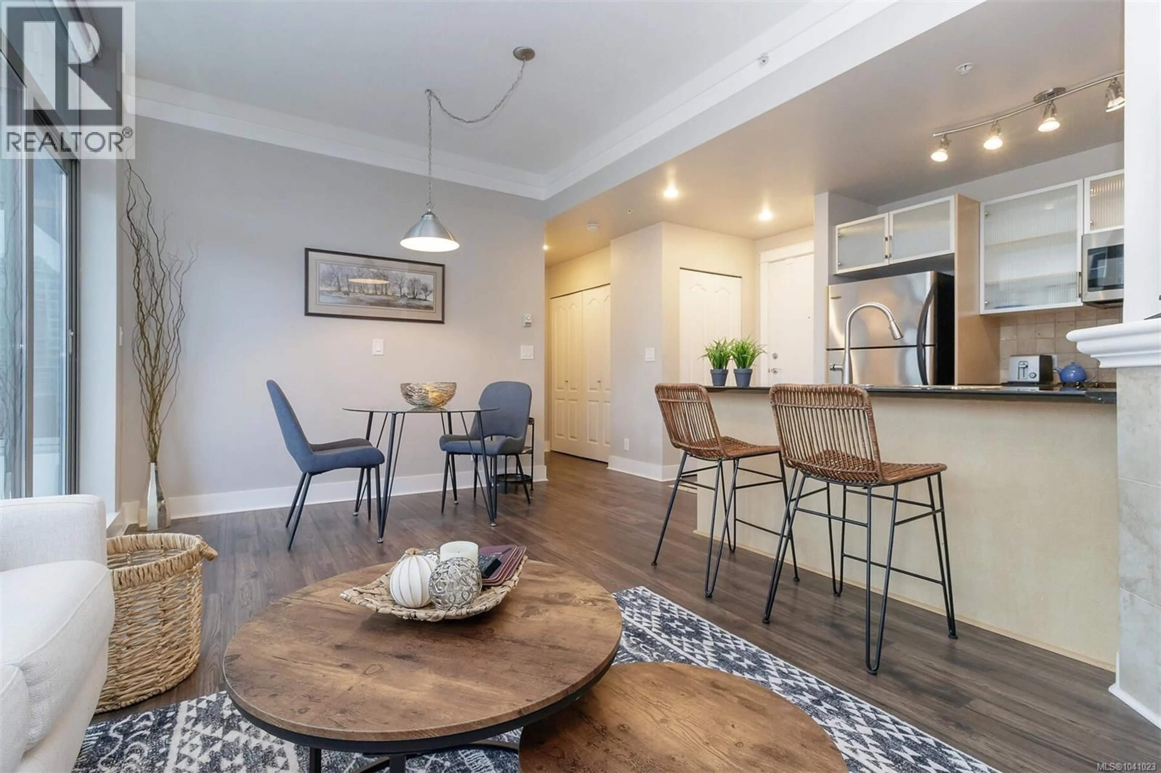 Open concept kitchen, wood/laminate floor for 406 - 845 YATES STREET, Victoria British Columbia V8W4A3