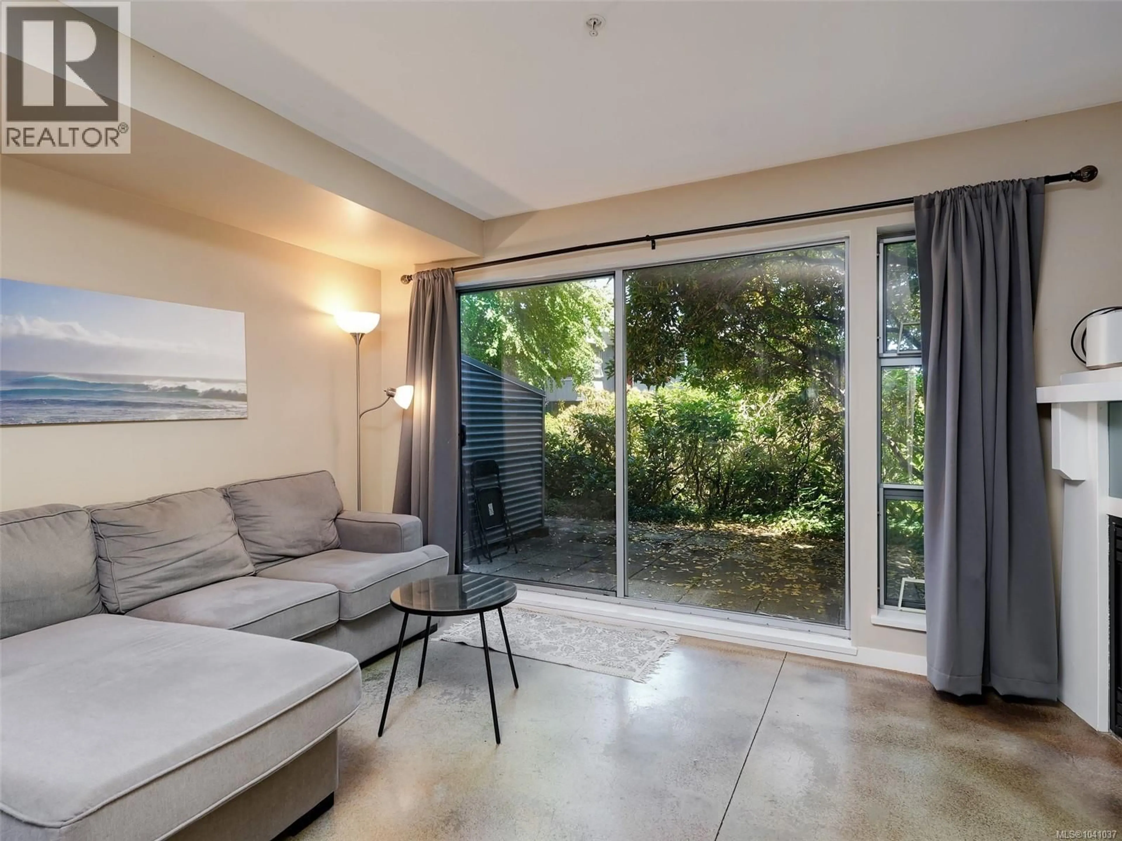 Living room with furniture, cement floor for 104 - 90 REGATTA LANDING, Victoria British Columbia V9A7R2