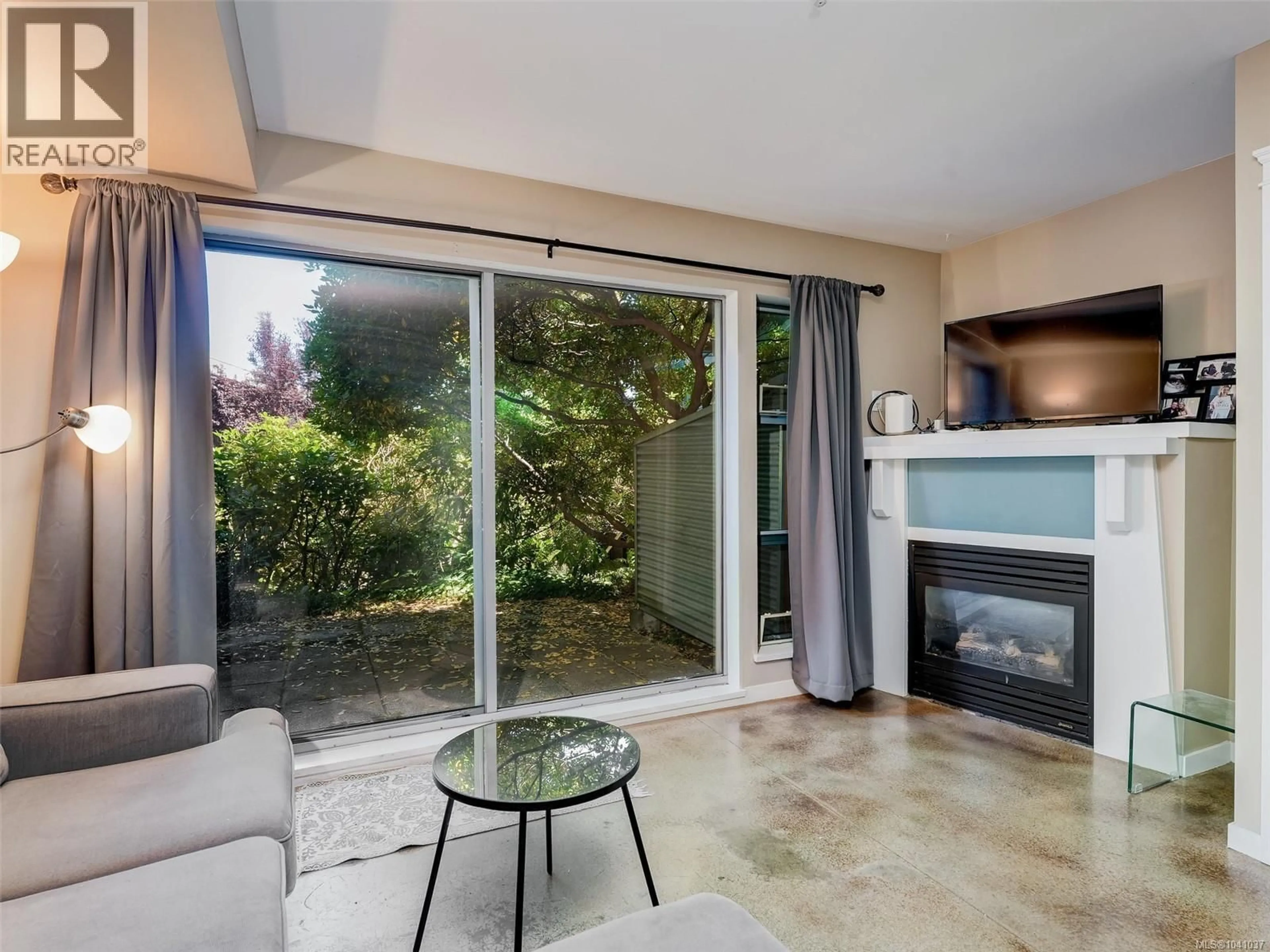 Living room with furniture, ceramic/tile floor for 104 - 90 REGATTA LANDING, Victoria British Columbia V9A7R2