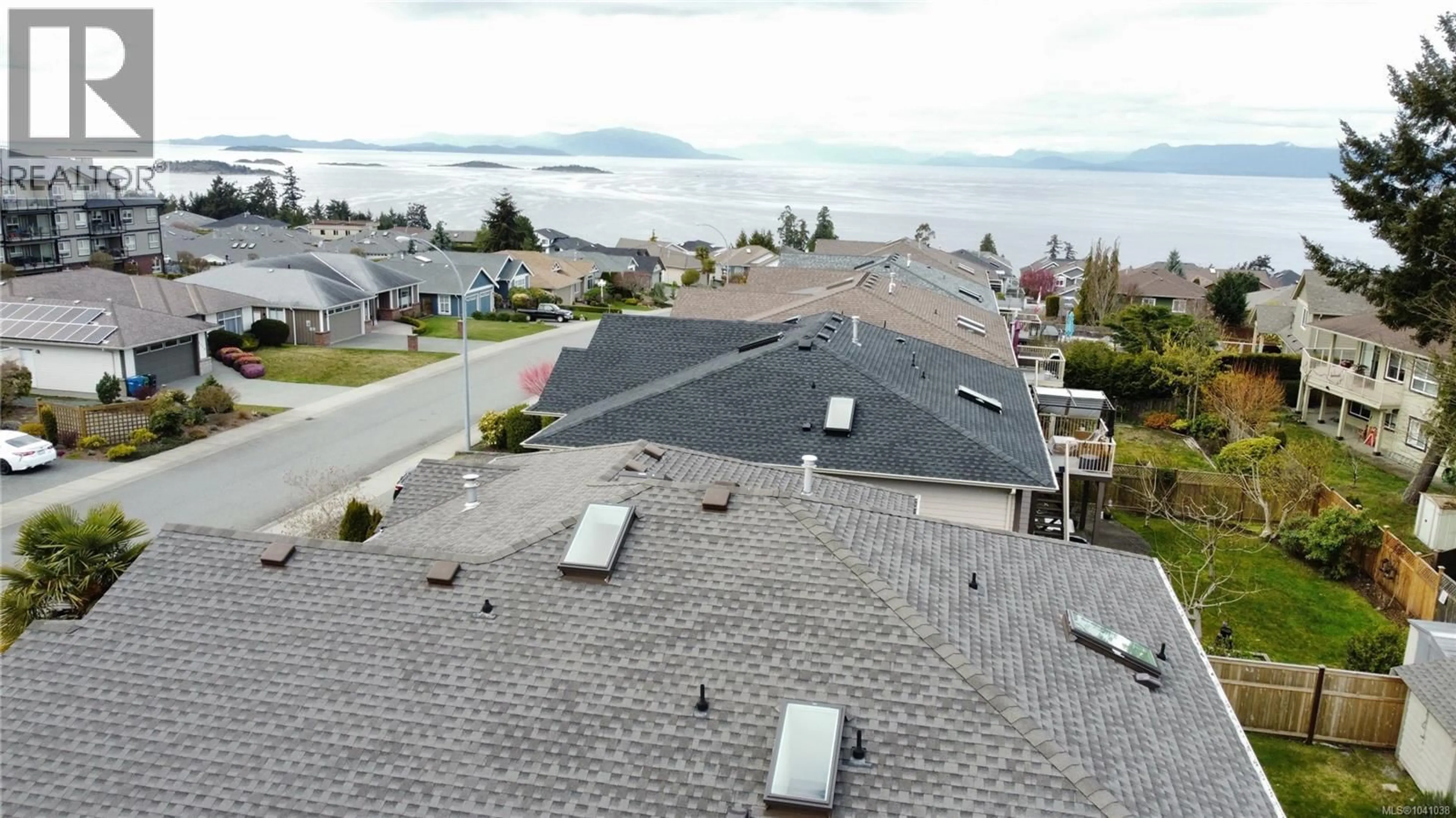 A pic from outside/outdoor area/front of a property/back of a property/a pic from drone, mountain view for 6593 KESTREL CRESCENT, Nanaimo British Columbia V9V1V9