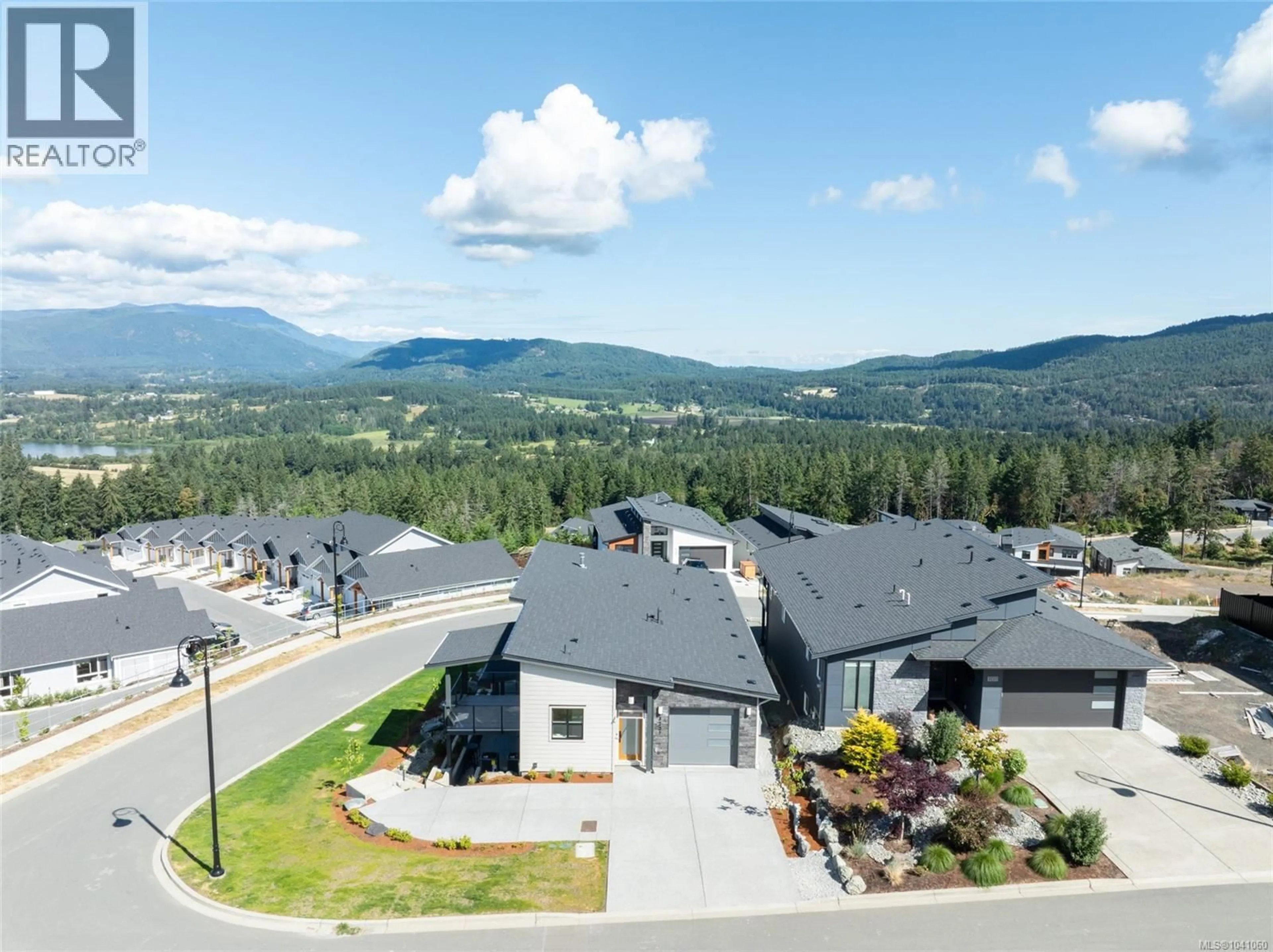 A pic from outside/outdoor area/front of a property/back of a property/a pic from drone, mountain view for 3227 WOODRUSH DRIVE, Duncan British Columbia V9L0J9