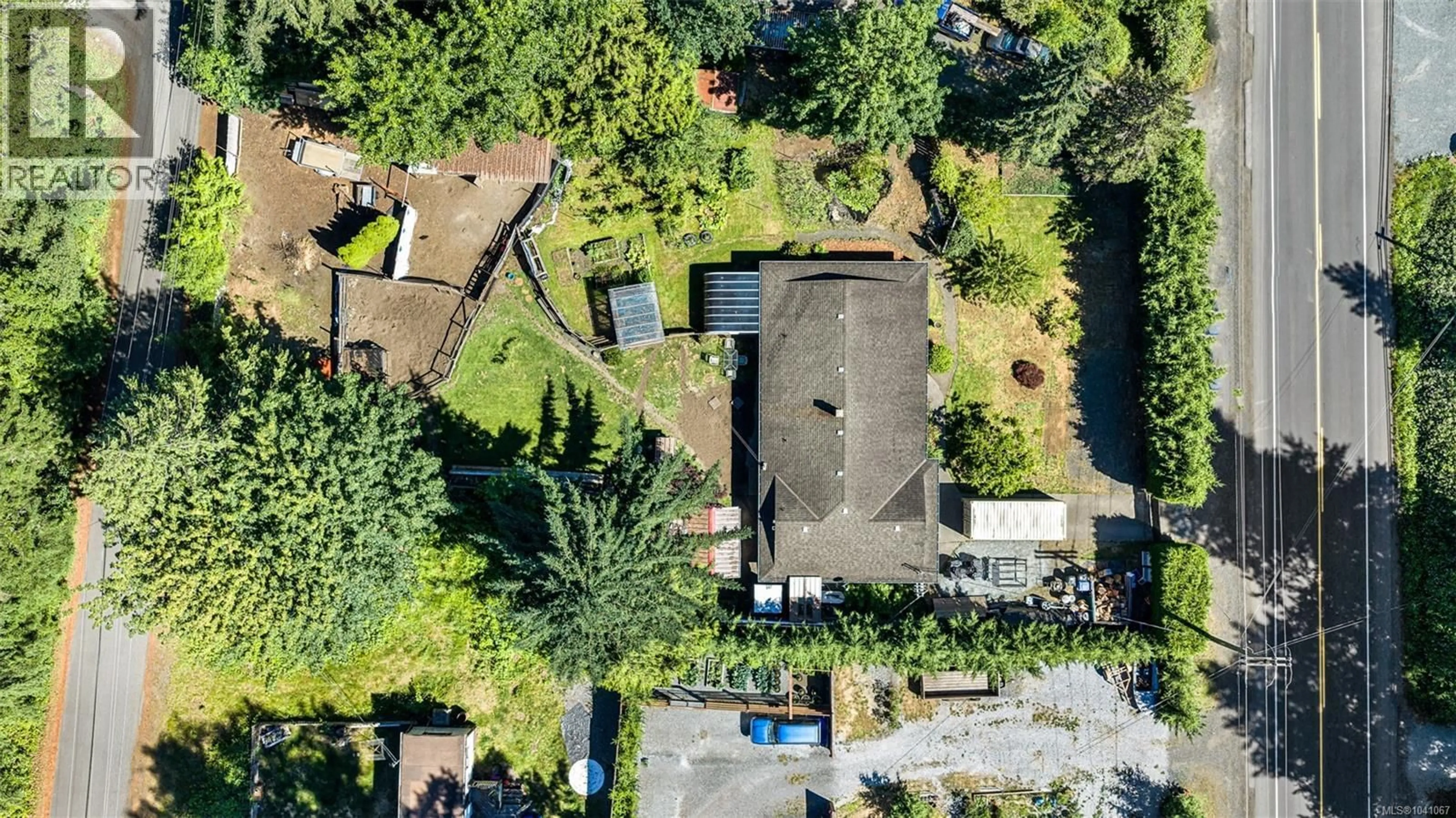 A pic from outside/outdoor area/front of a property/back of a property/a pic from drone, street for 2614 SHAWNIGAN LAKE ROAD EAST, Shawnigan Lake British Columbia V0R2W0