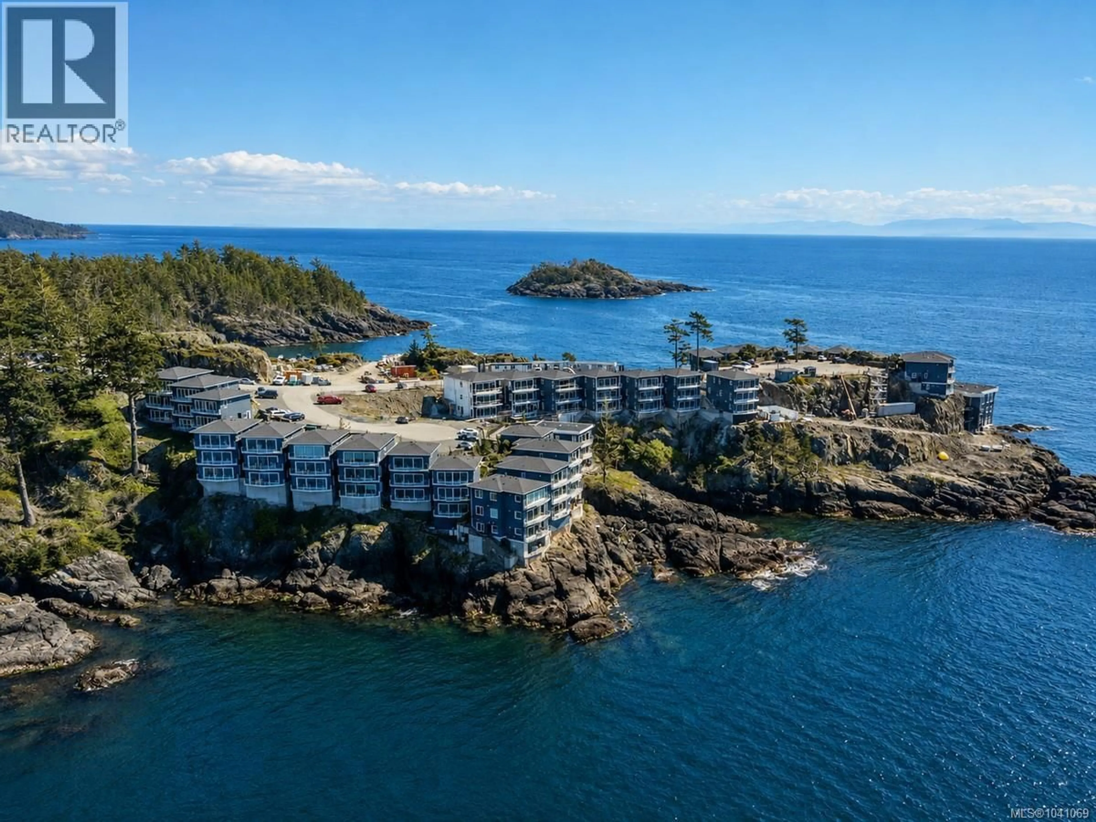 A pic from outside/outdoor area/front of a property/back of a property/a pic from drone, water/lake/river/ocean view for 5C - 1000 SOOKEPOINT PLACE, Sooke British Columbia V9Z1N8