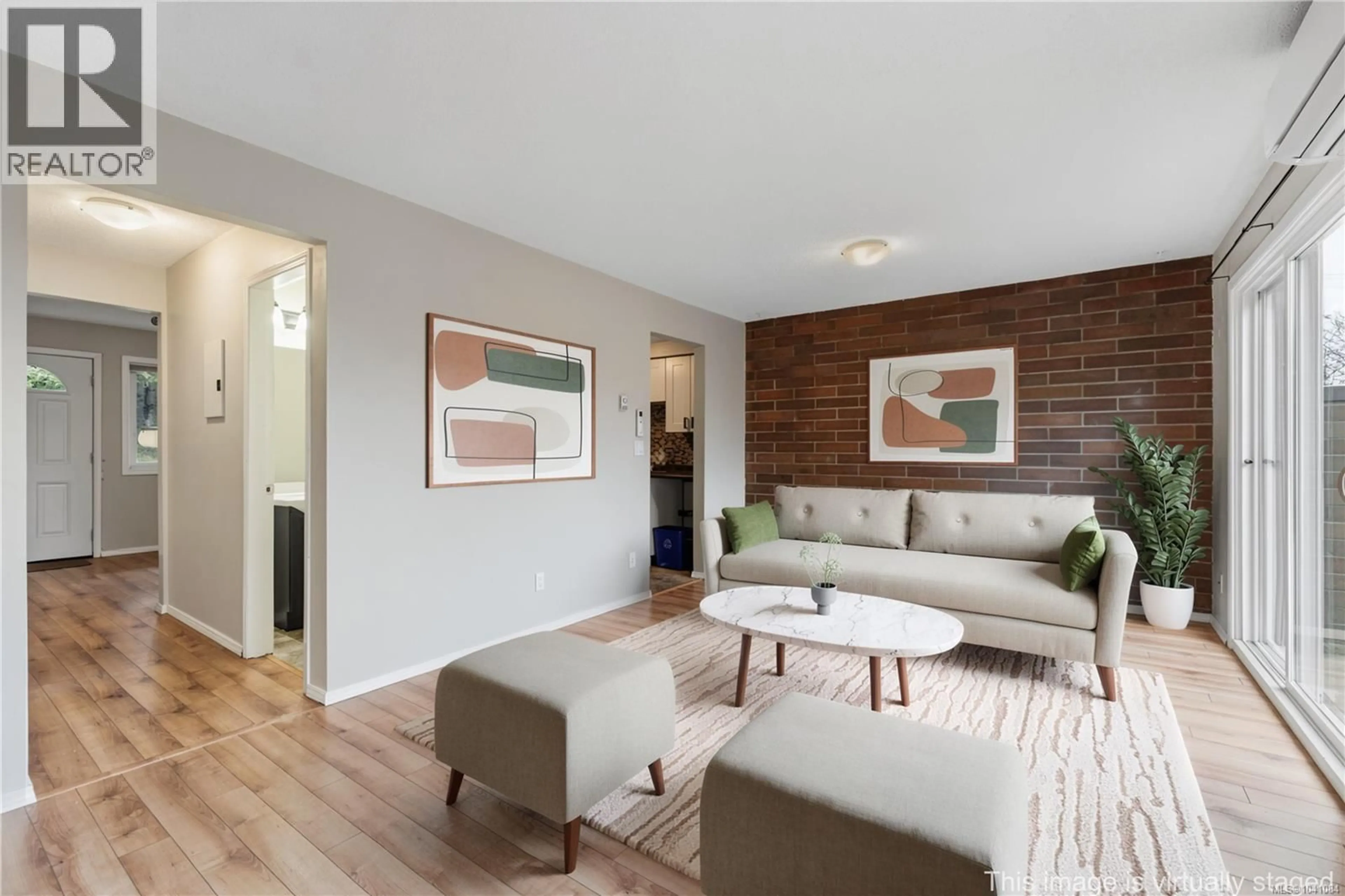 Living room with furniture, wood/laminate floor for 6 - 285 HAREWOOD ROAD, Nanaimo British Columbia V9Y2Z1