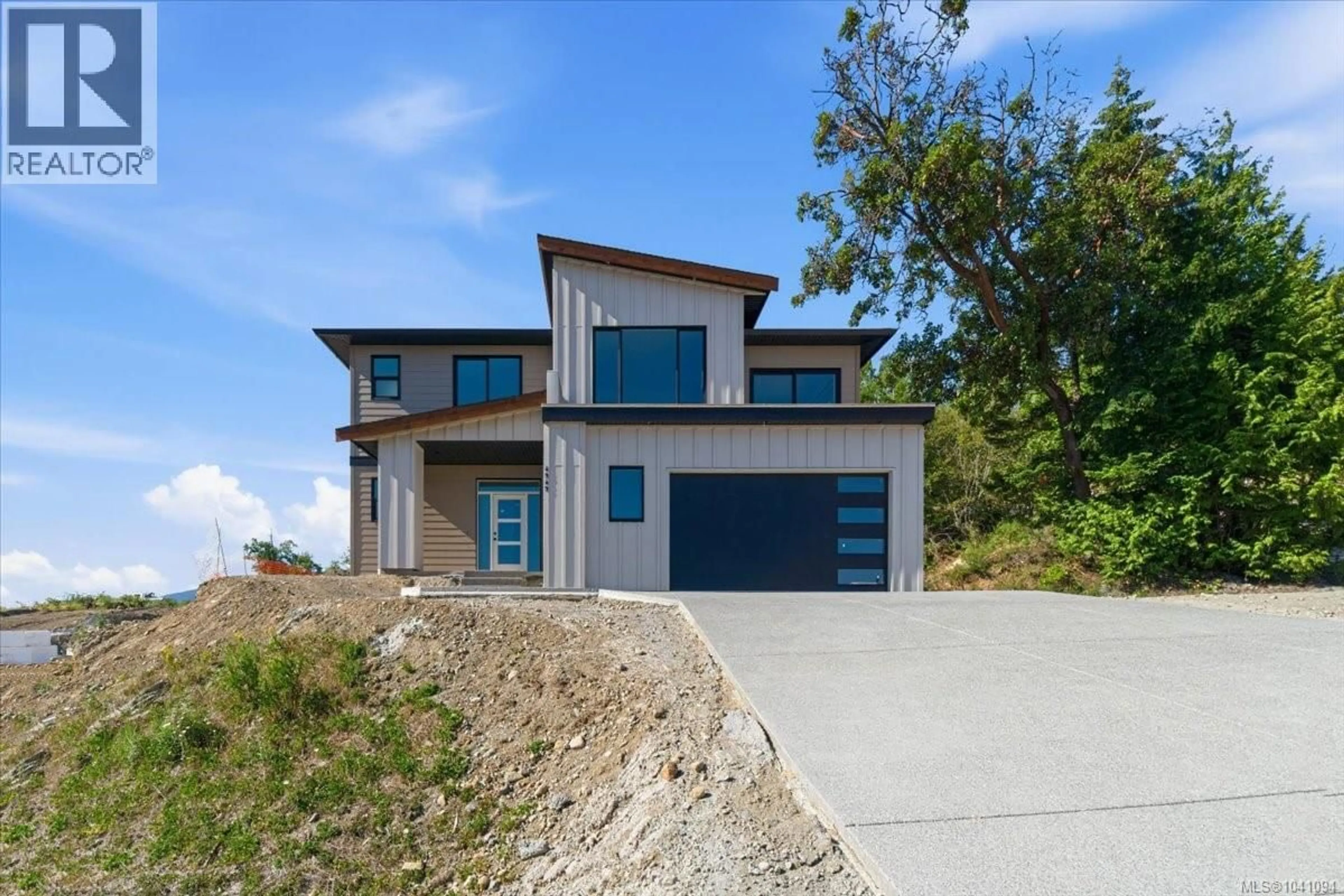 Home with brick exterior material, unknown for 4949 DIXON LANE, Lantzville British Columbia V0R2H0