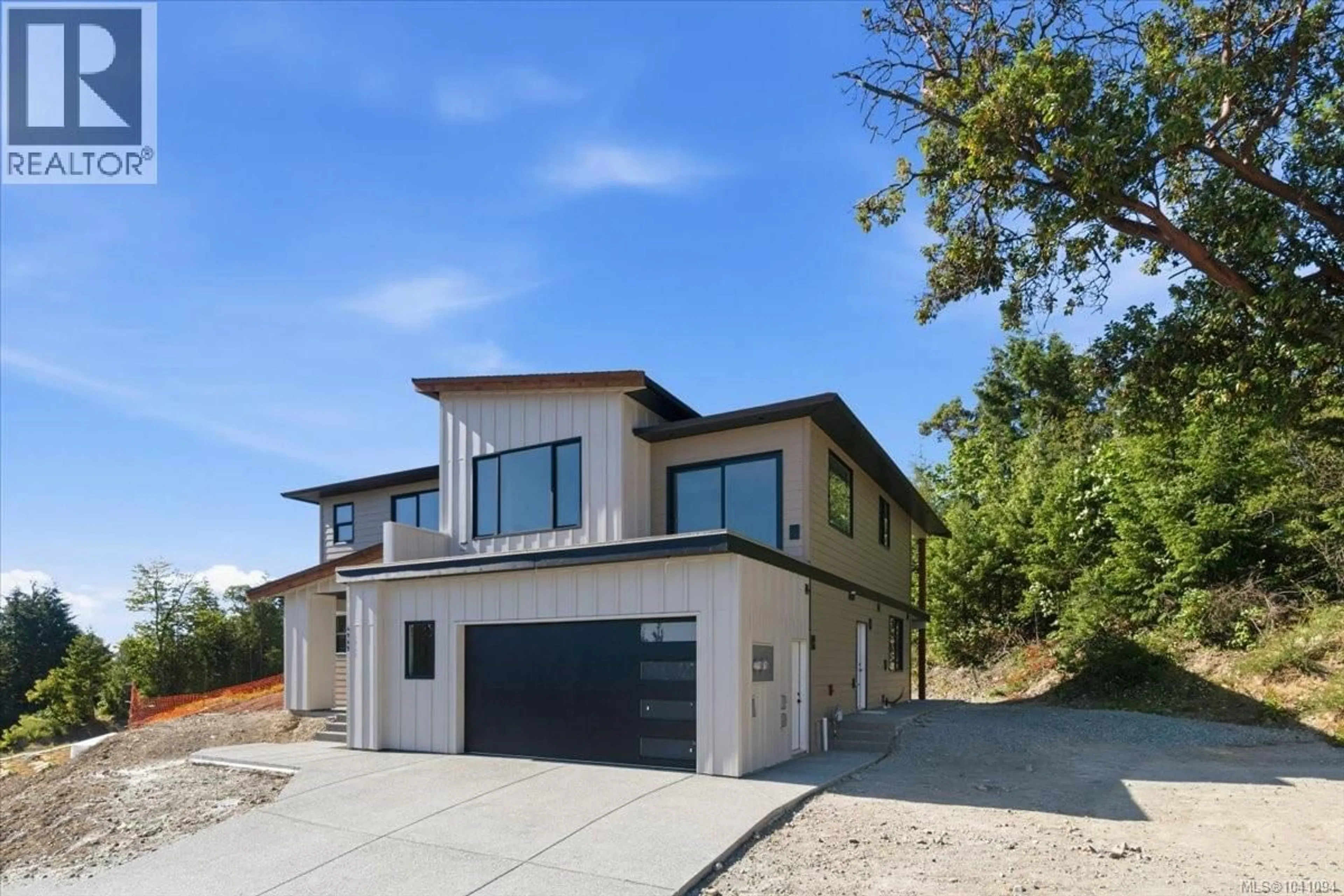 Home with brick exterior material, street for 4949 DIXON LANE, Lantzville British Columbia V0R2H0