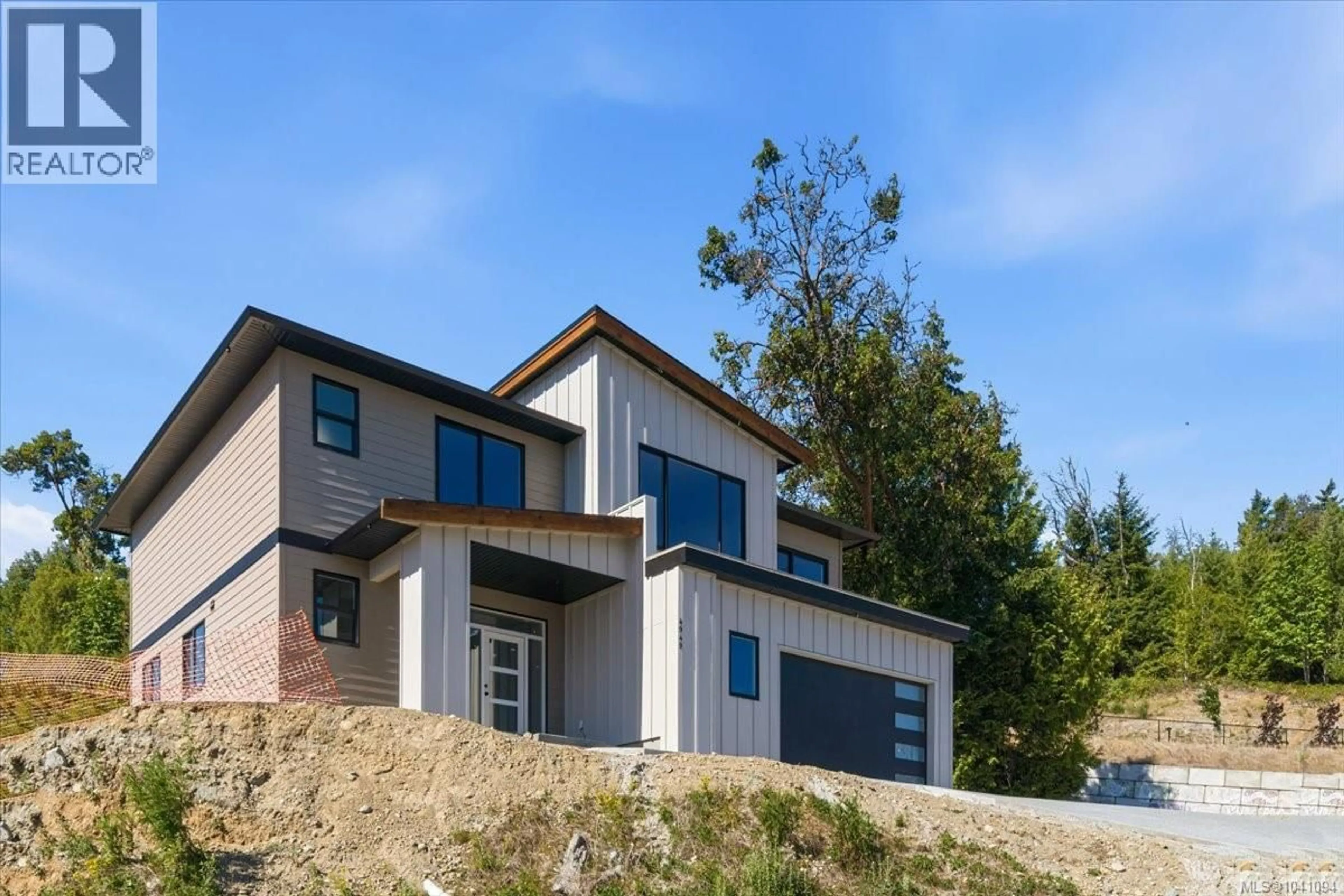 Home with brick exterior material, unknown for 4949 DIXON LANE, Lantzville British Columbia V0R2H0