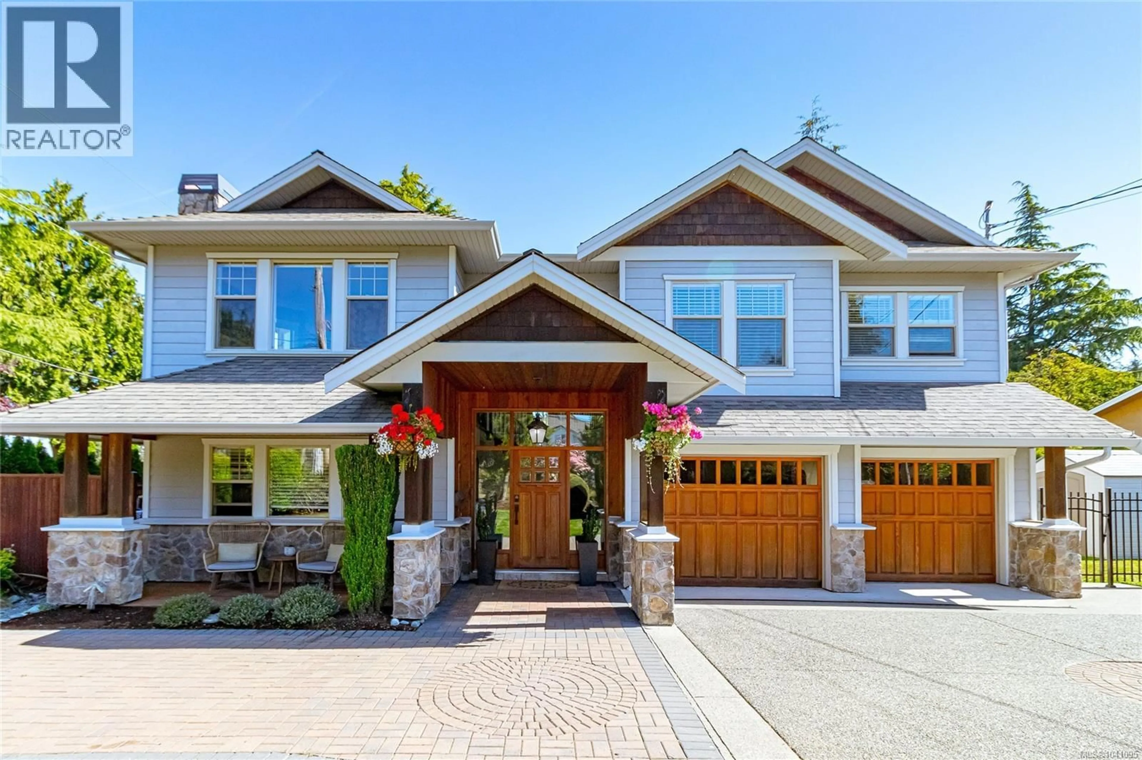 Home with brick exterior material, street for 1786 BARRIE ROAD, Saanich British Columbia V8N2W7