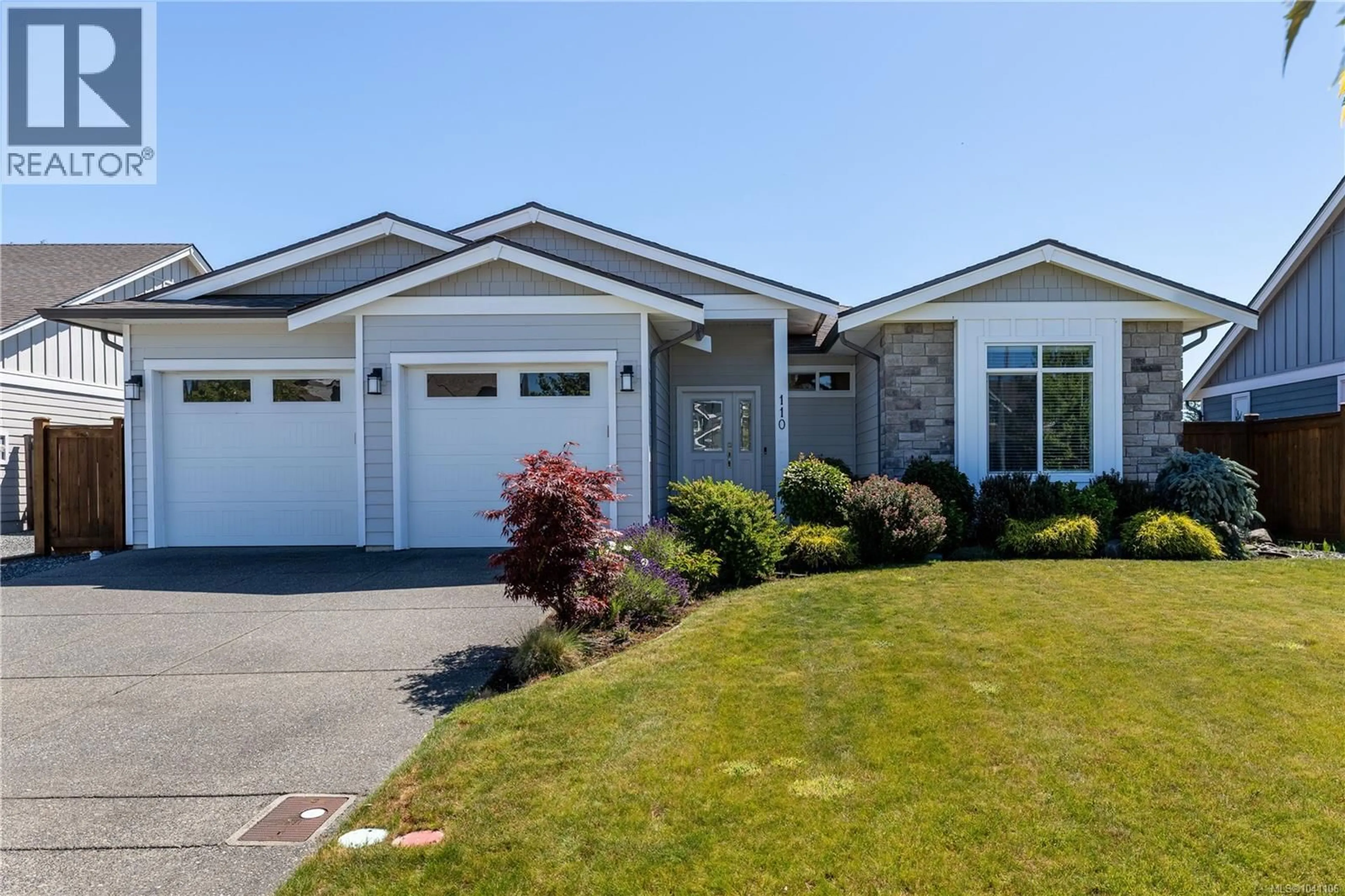 Home with vinyl exterior material, street for 110 NIKOLA ROAD, Campbell River British Columbia V9W0C9