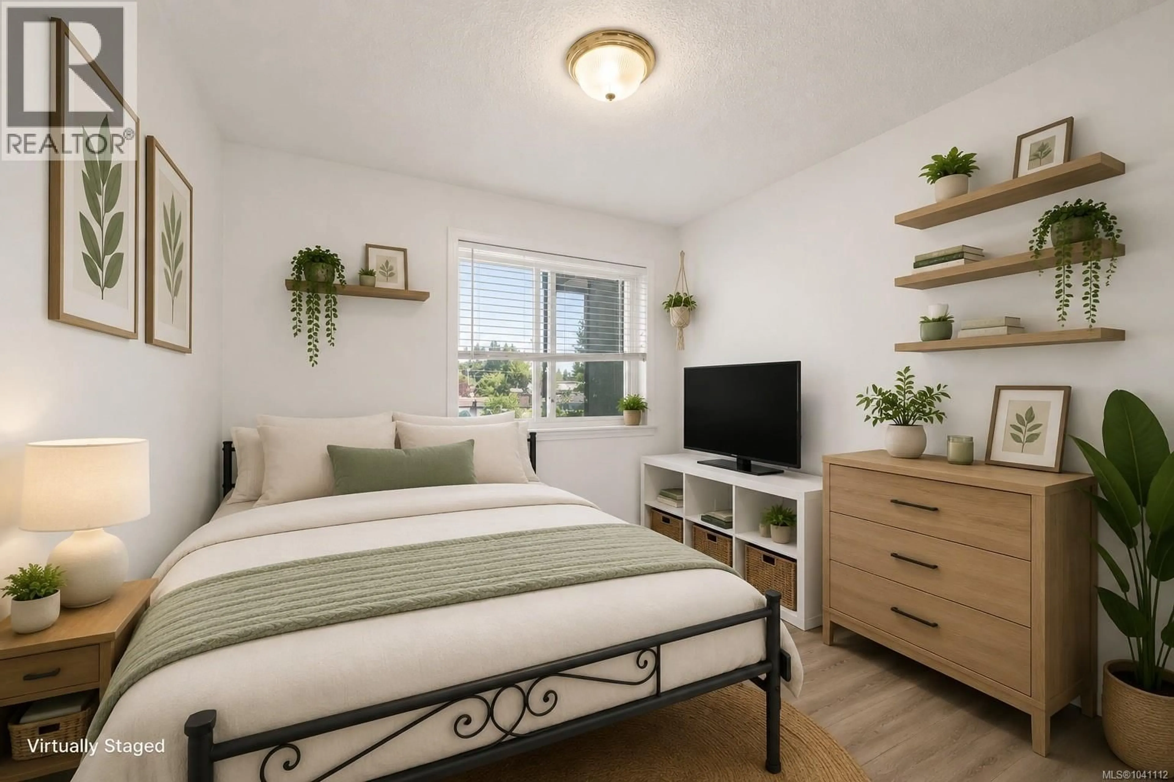 Bedroom with bed, wood/laminate floor for 301 - 1130 WILLEMAR AVENUE, Courtenay British Columbia V9N3L9