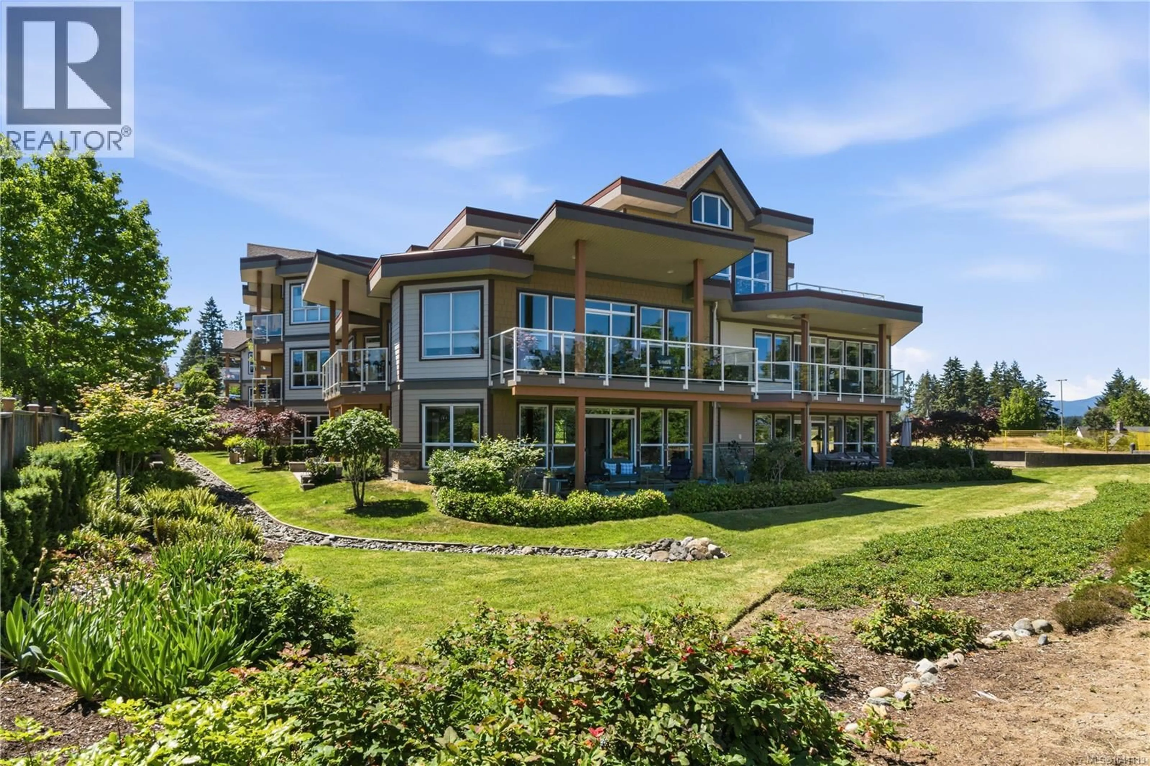 A pic from outside/outdoor area/front of a property/back of a property/a pic from drone, water/lake/river/ocean view for 302 - 439 COLLEGE ROAD, Qualicum Beach British Columbia V9K0B2