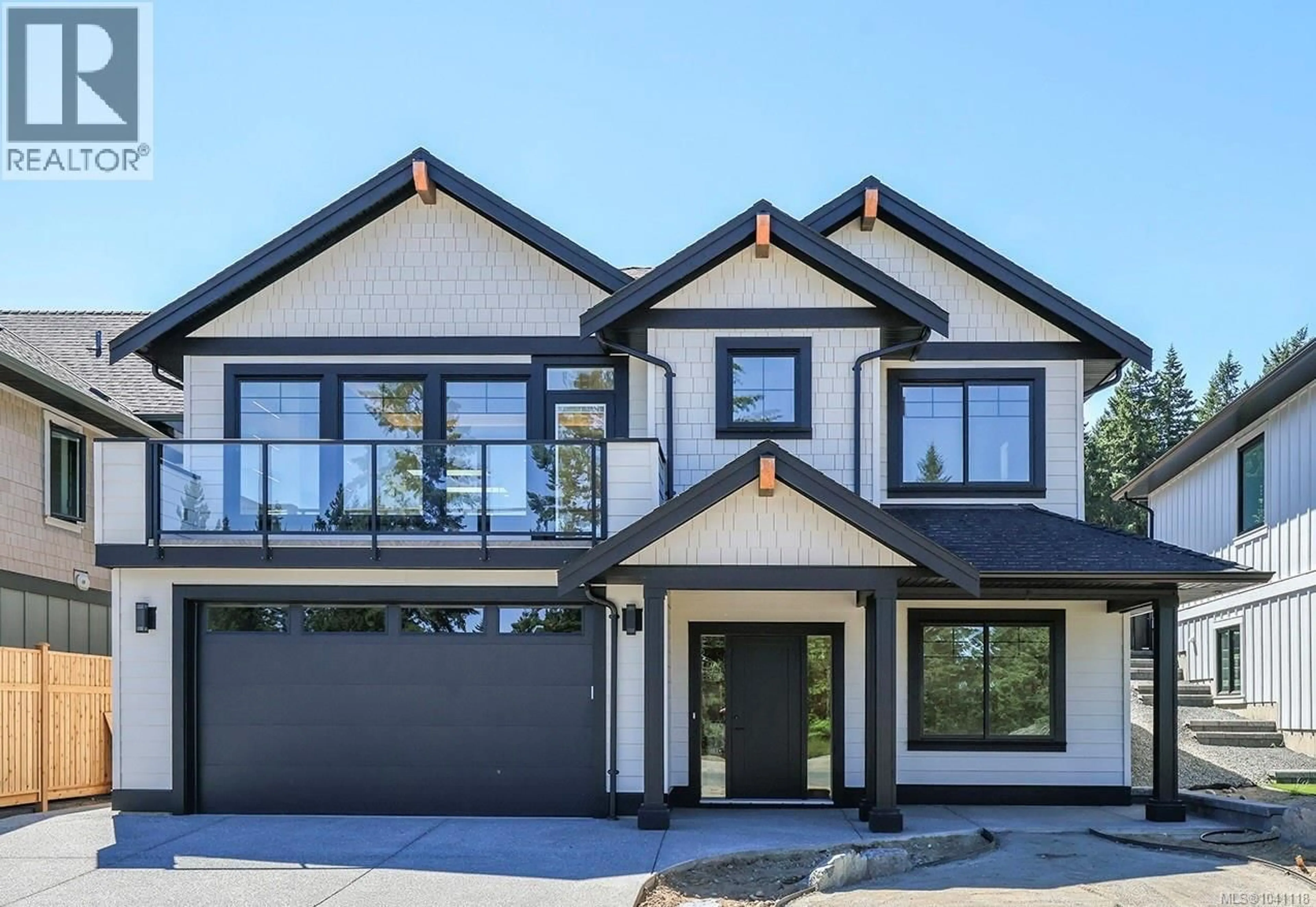 Home with brick exterior material, street for 1661 CROWN ISLE BOULEVARD, Courtenay British Columbia V9N9X5