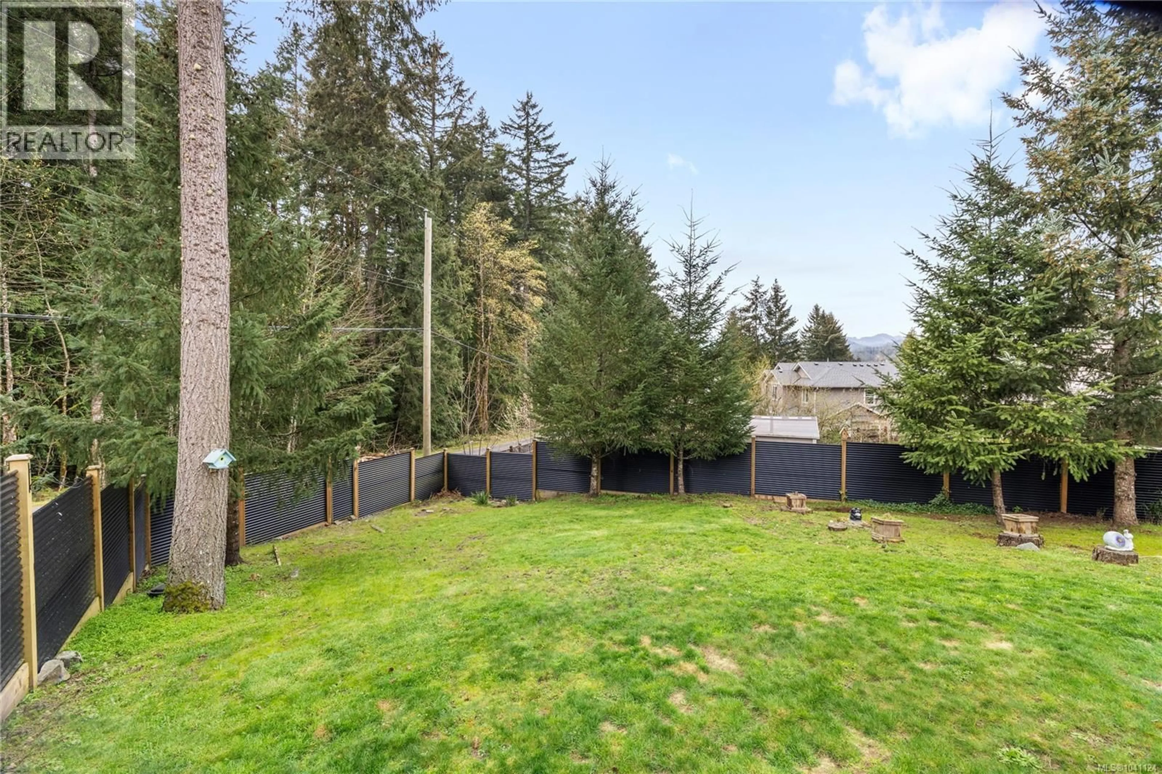A pic from outside/outdoor area/front of a property/back of a property/a pic from drone, forest/trees view for 5419 COLINWOOD DRIVE, Nanaimo British Columbia V9T6G2