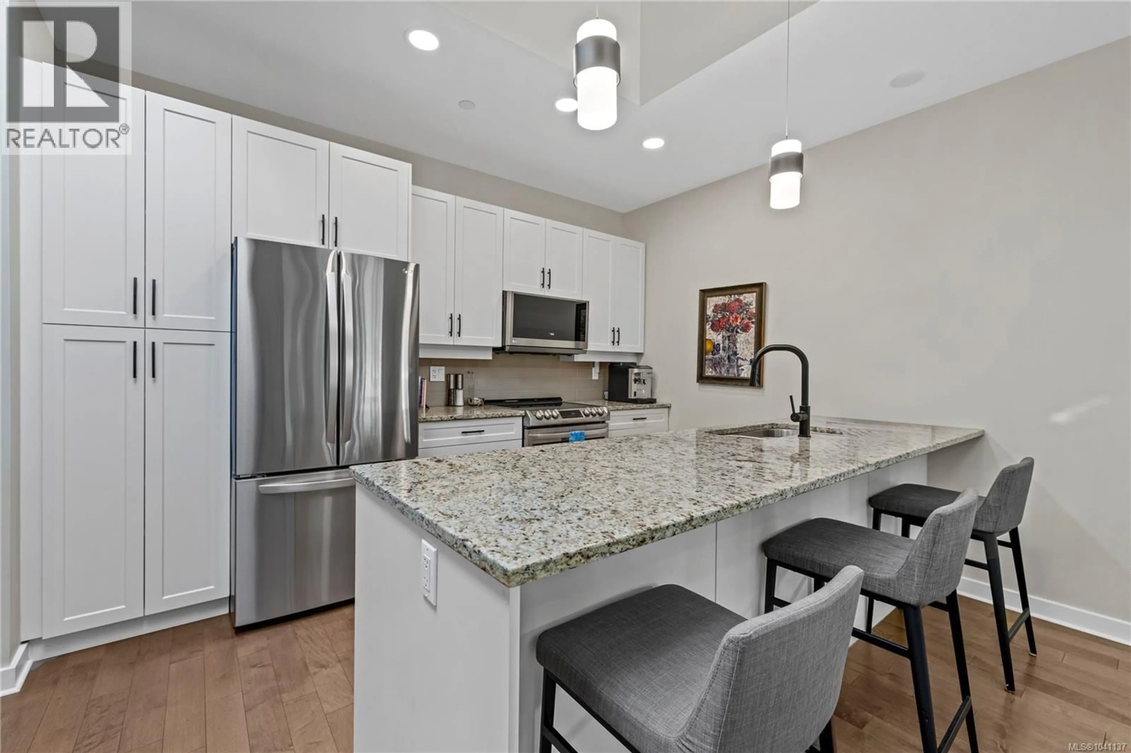 Open concept kitchen, ceramic/tile floor for 8 - 500 CORFIELD STREET, Parksville British Columbia V9P0A8
