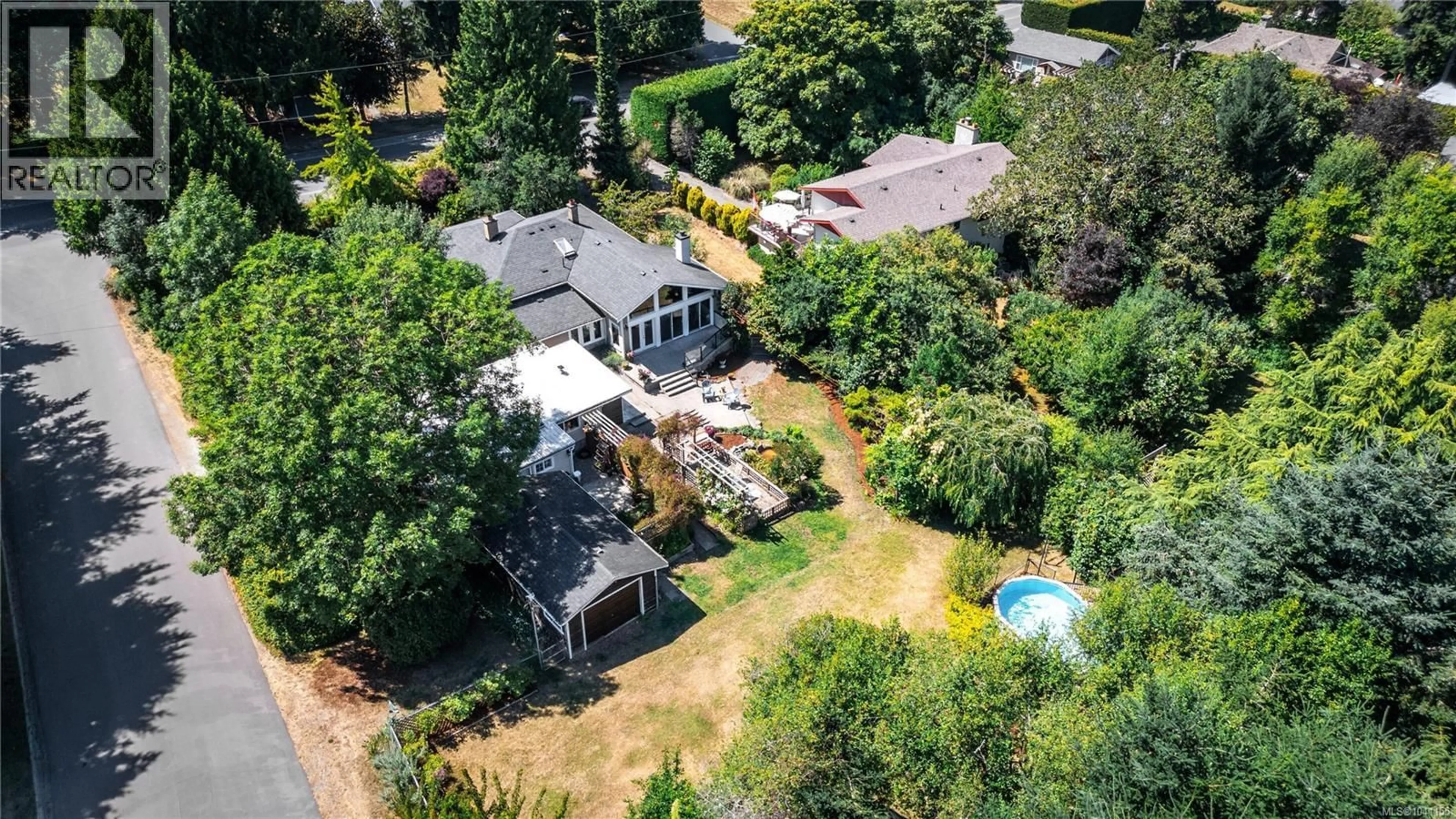 A pic from outside/outdoor area/front of a property/back of a property/a pic from drone, street for 9255 EAST SAANICH ROAD, North Saanich British Columbia V8L1H6