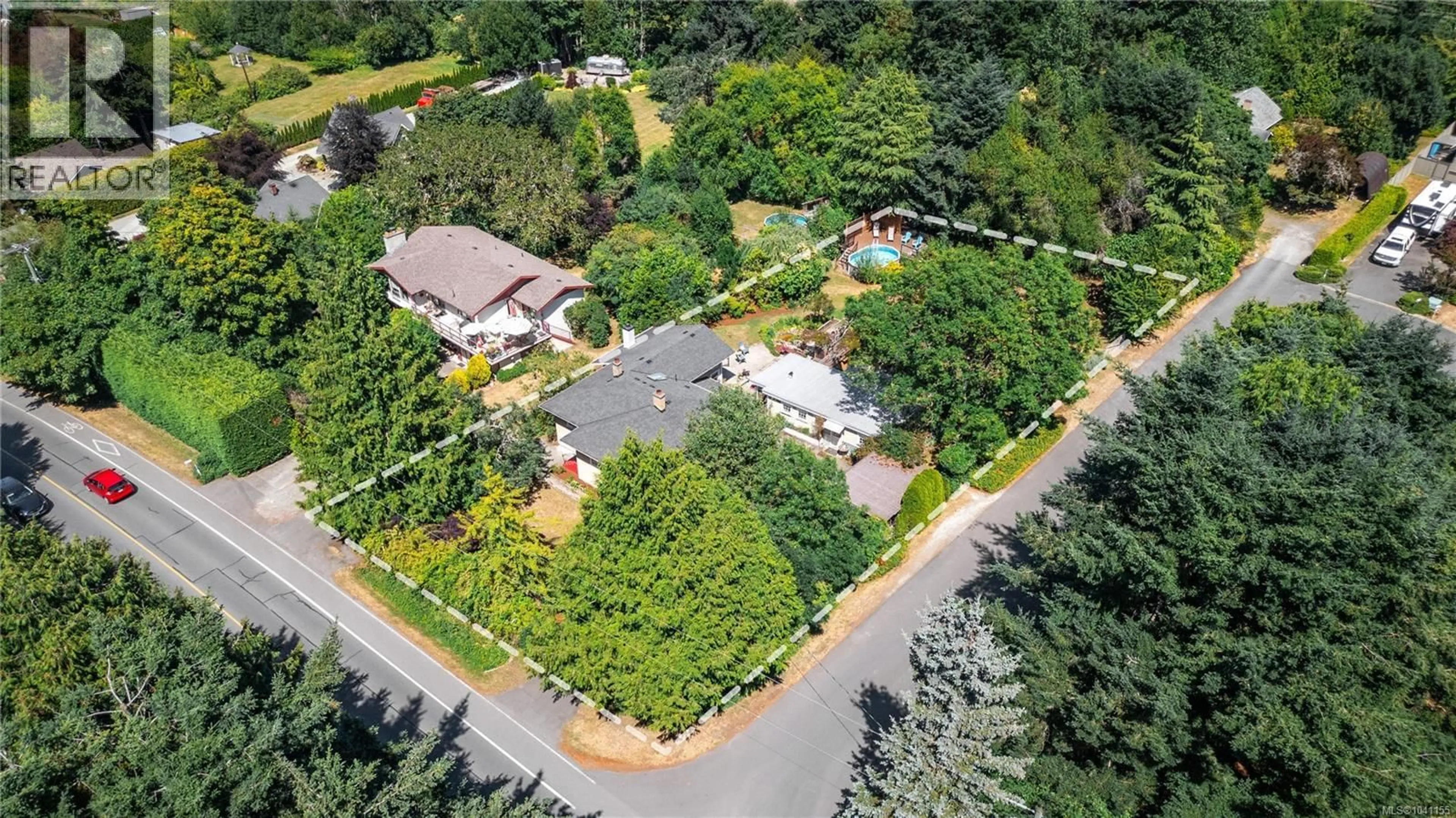 A pic from outside/outdoor area/front of a property/back of a property/a pic from drone, street for 9255 EAST SAANICH ROAD, North Saanich British Columbia V8L1H6