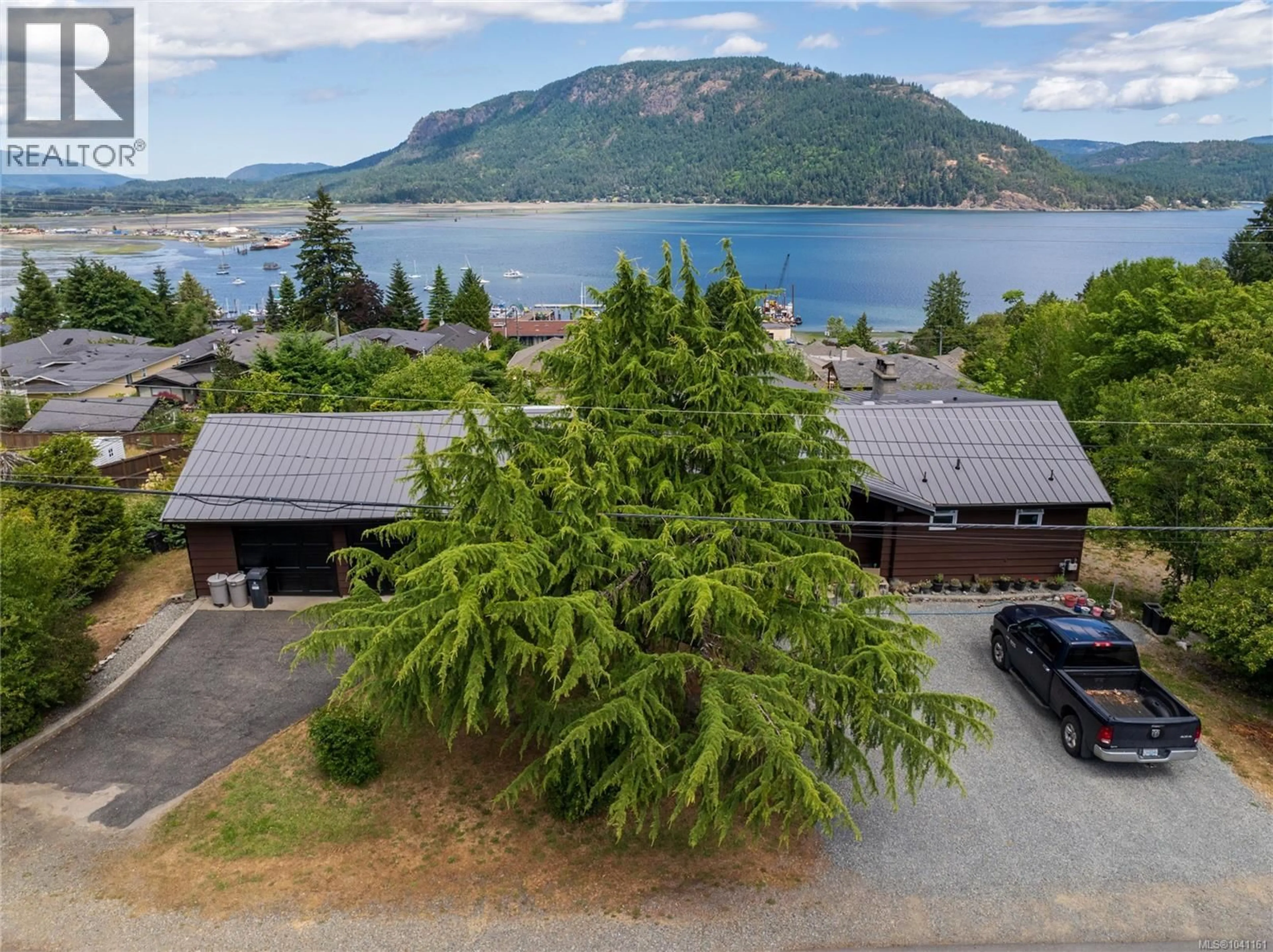 A pic from outside/outdoor area/front of a property/back of a property/a pic from drone, water/lake/river/ocean view for 1711 PAVENHAM ROAD, Cowichan Bay British Columbia V0R1N1