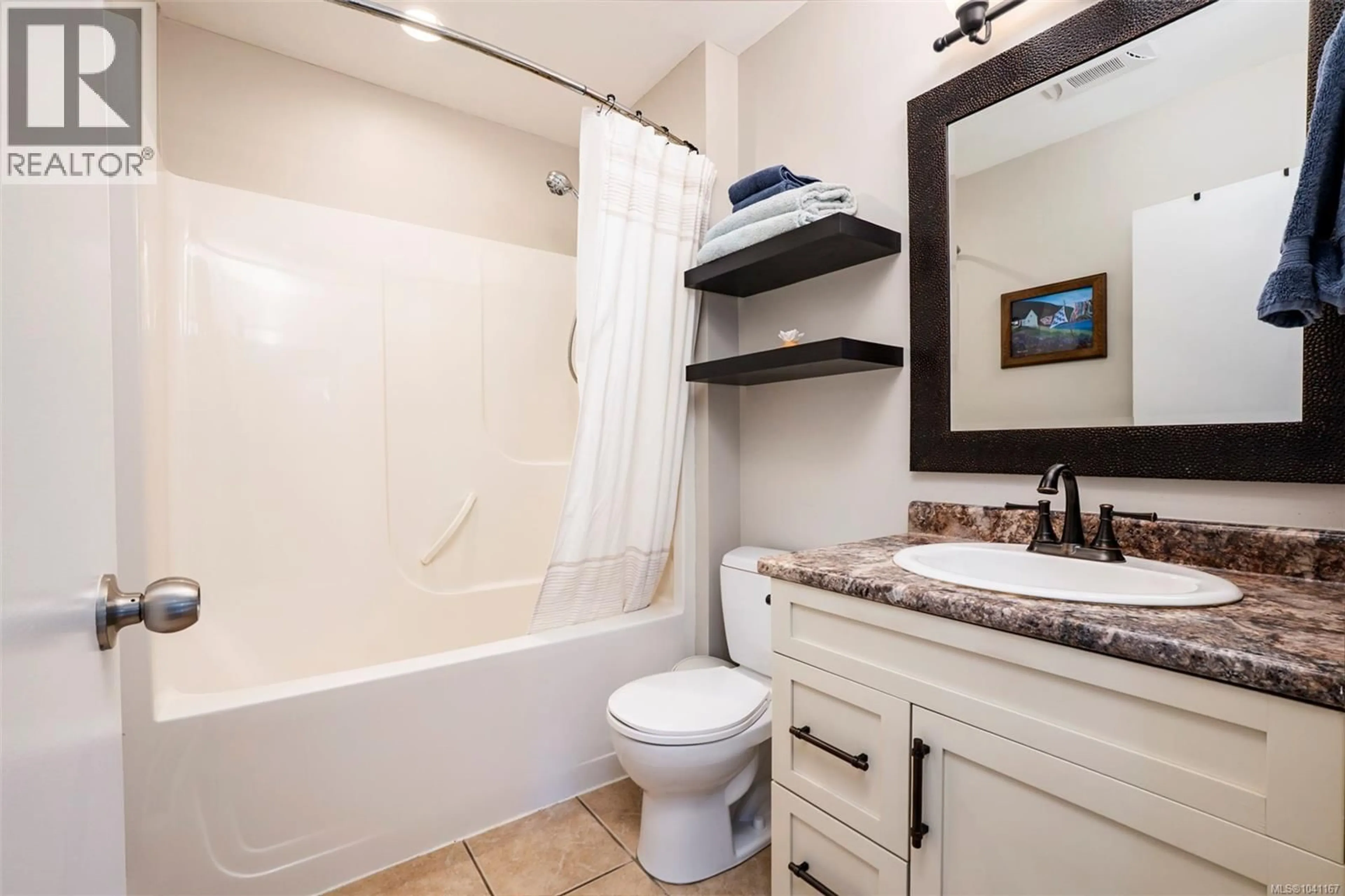 Standard bathroom, ceramic/tile floor for 150 WAKESIAH AVENUE, Nanaimo British Columbia V9R3J9