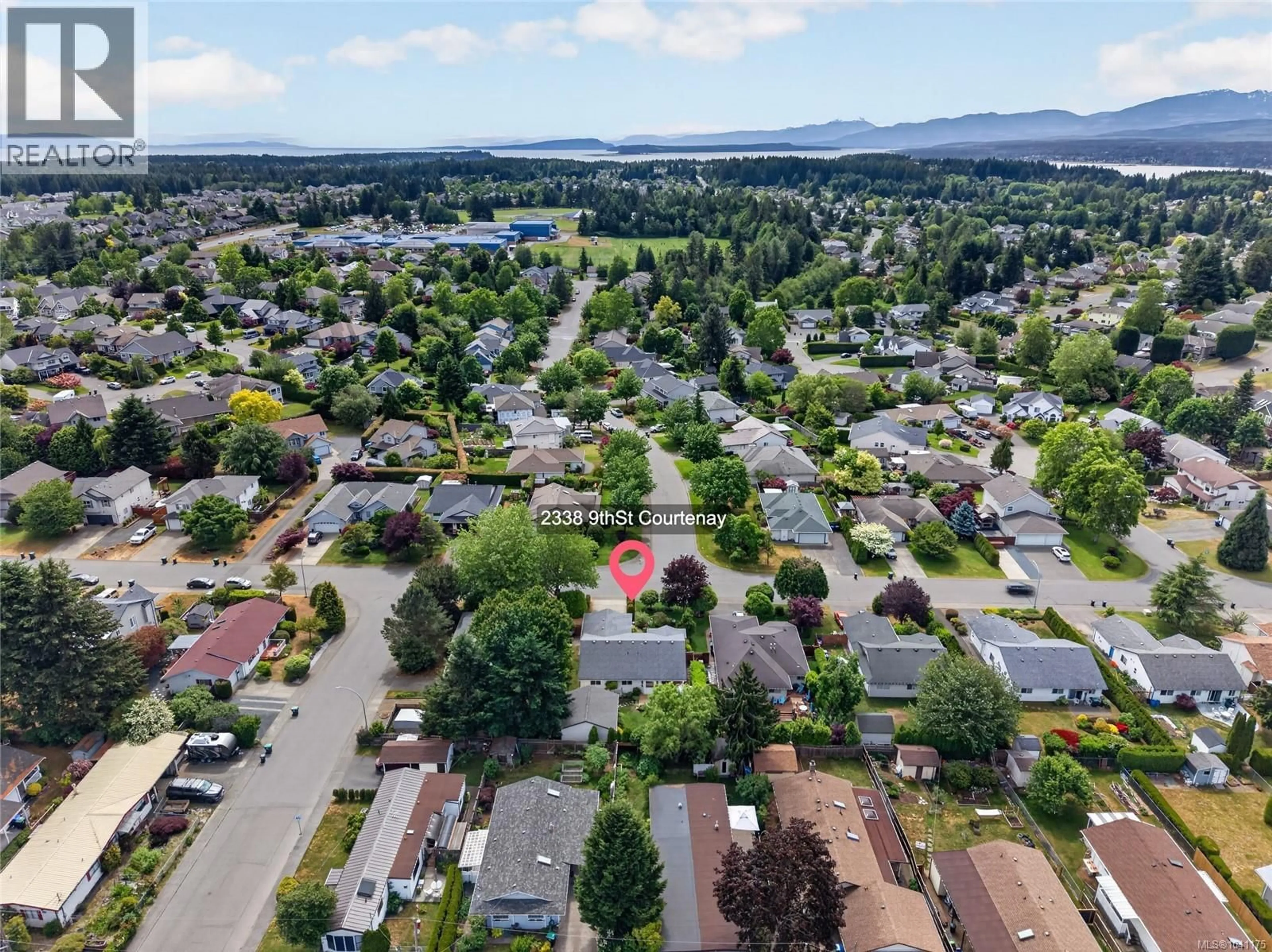A pic from outside/outdoor area/front of a property/back of a property/a pic from drone, mountain view for 2338 9TH STREET EAST, Courtenay British Columbia V9N8Z2