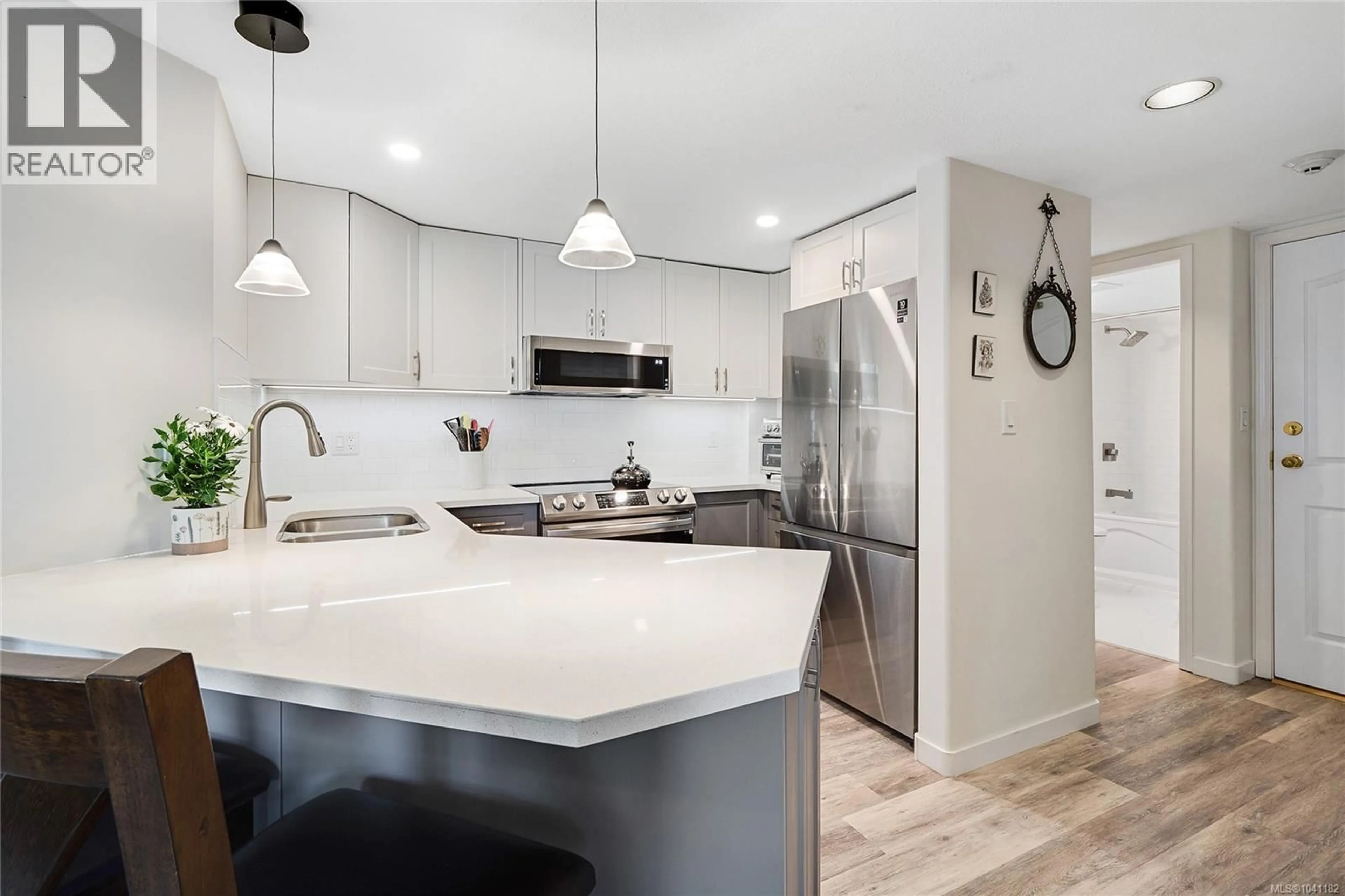 Open concept kitchen, ceramic/tile floor for 402 - 930 YATES STREET, Victoria British Columbia V8V4Z3