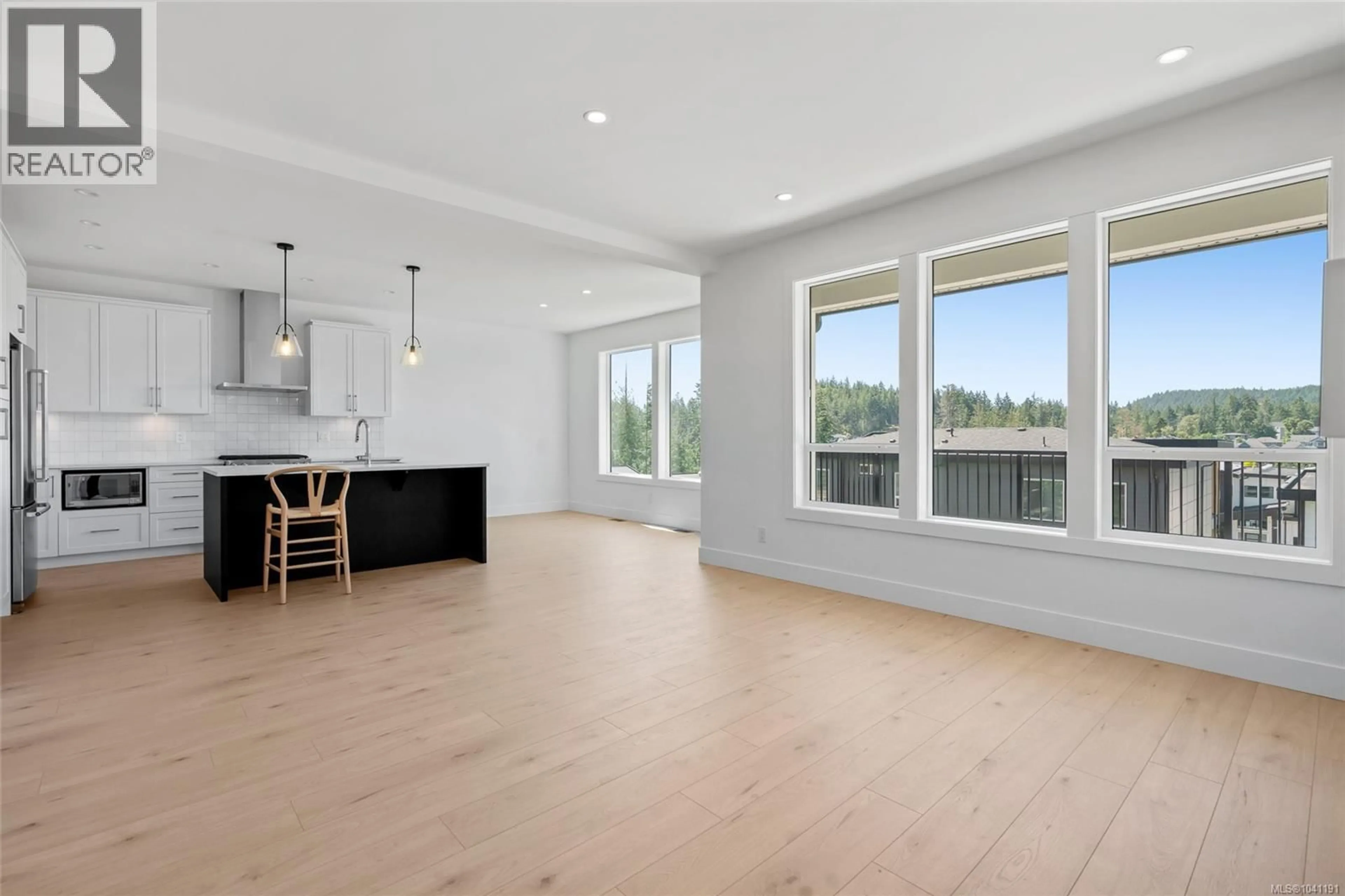 Open concept kitchen, wood/laminate floor for 1256 ASHMORE TERRACE, Langford British Columbia V9C0S6