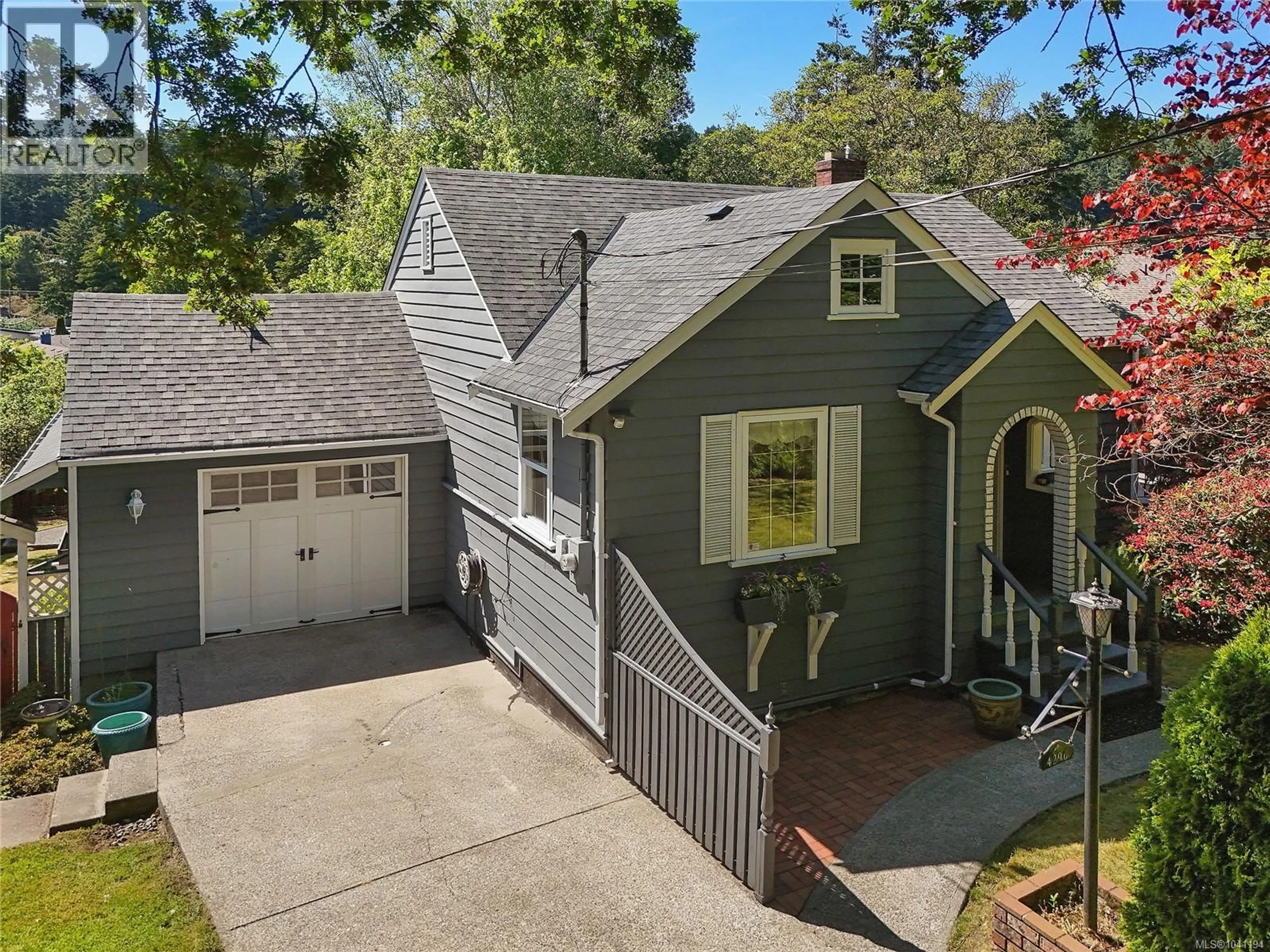 A pic from outside/outdoor area/front of a property/back of a property/a pic from drone, street for 4296 CEDAR HILL ROAD, Saanich British Columbia V8N3C5