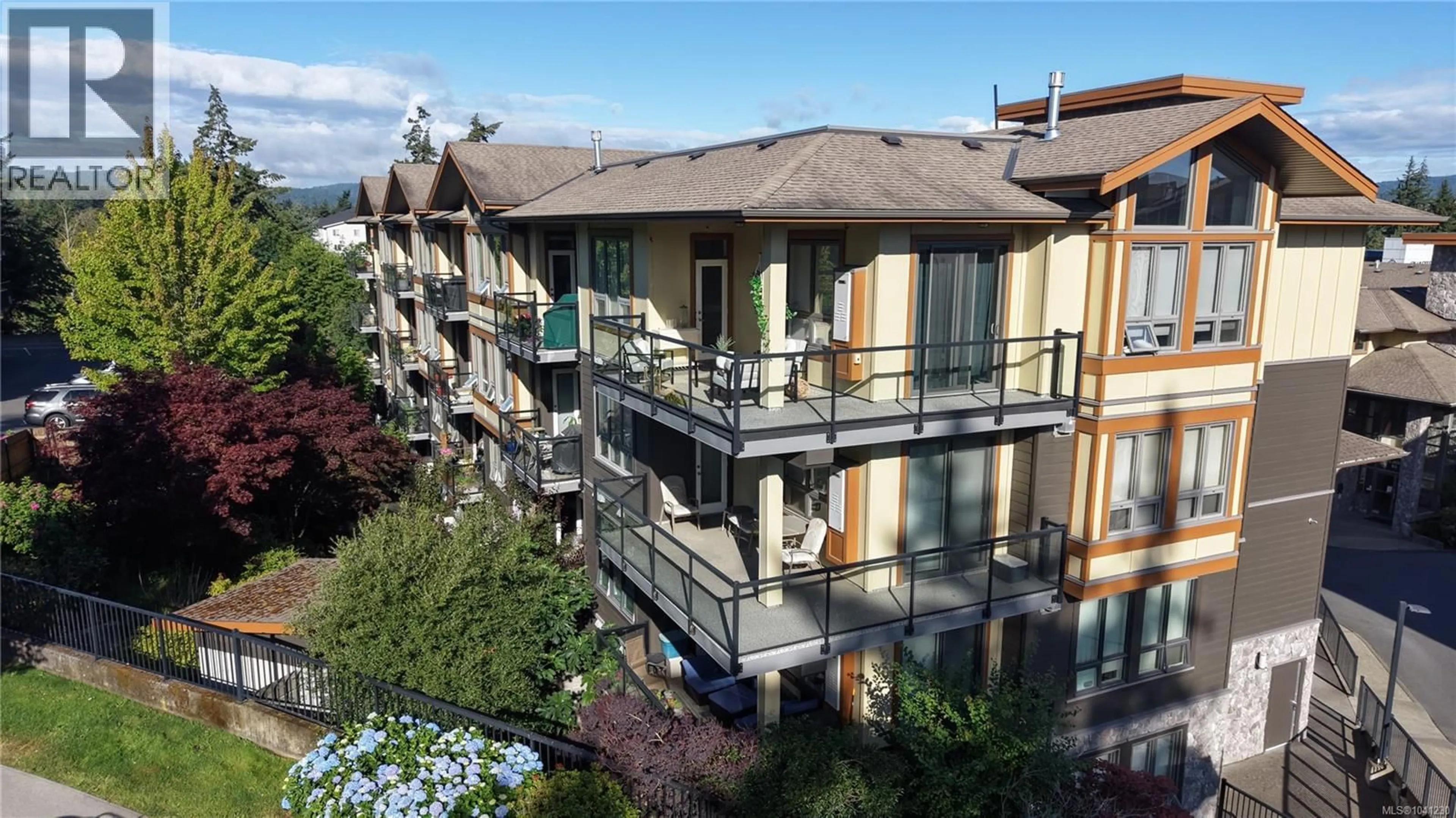 A pic from outside/outdoor area/front of a property/back of a property/a pic from drone, city buildings view from balcony for 401 - 3226 JACKLIN ROAD SOUTHEAST, Langford British Columbia V9B0J5